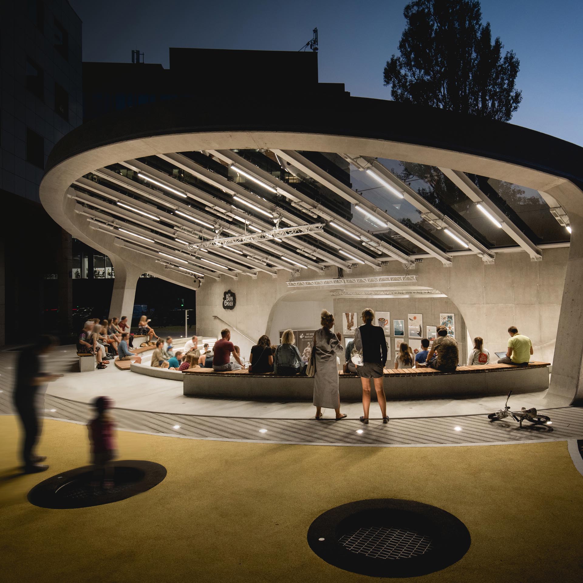 The Be Amphitheatre has been designed with a circular shape, covered by the massive, glass filled - concrete roof, and supported by the ferroconcrete wall.