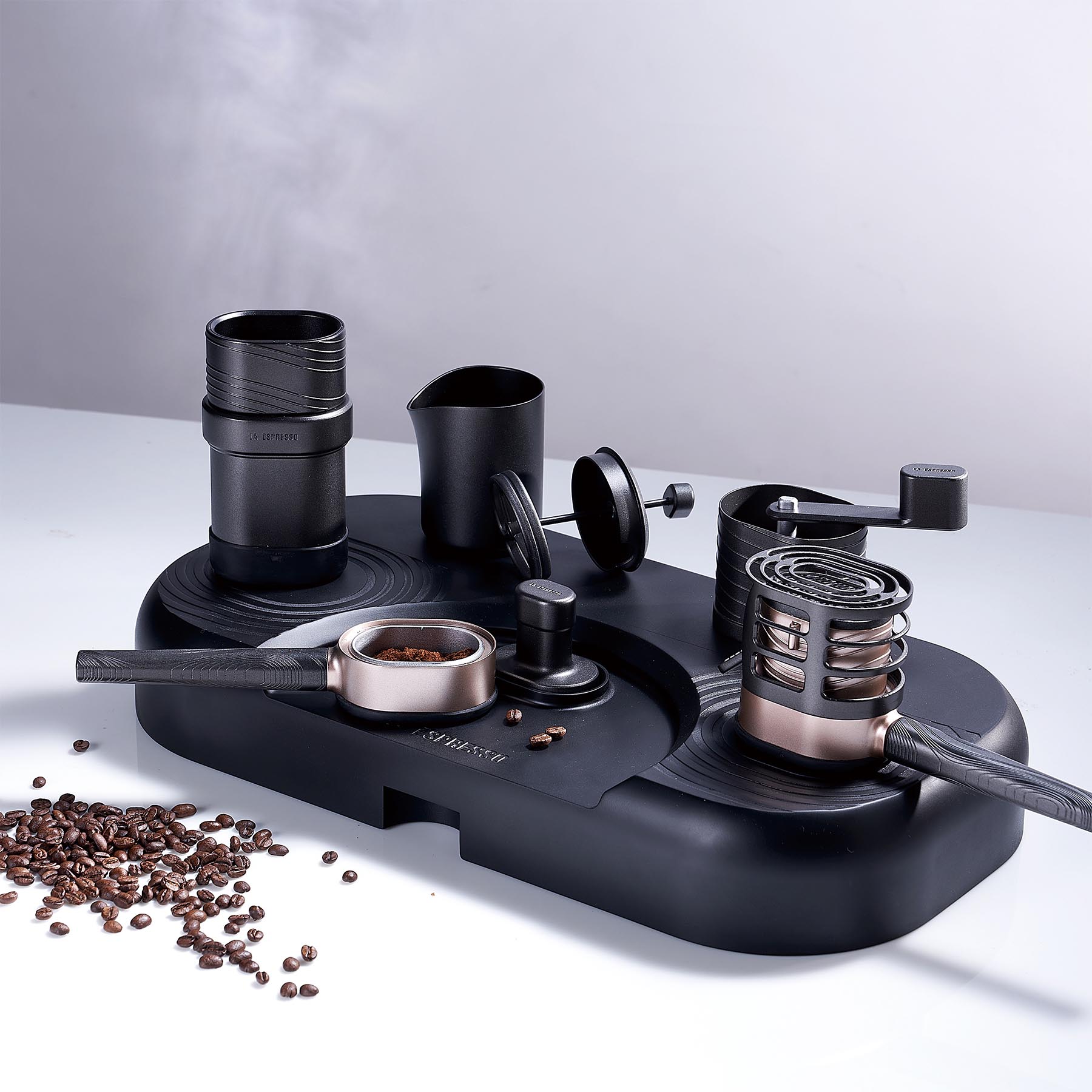 La Espresso is a travel-style coffee set that integrates all the brewing coffee processes from heating, grinding beans, extracting, and frothing.