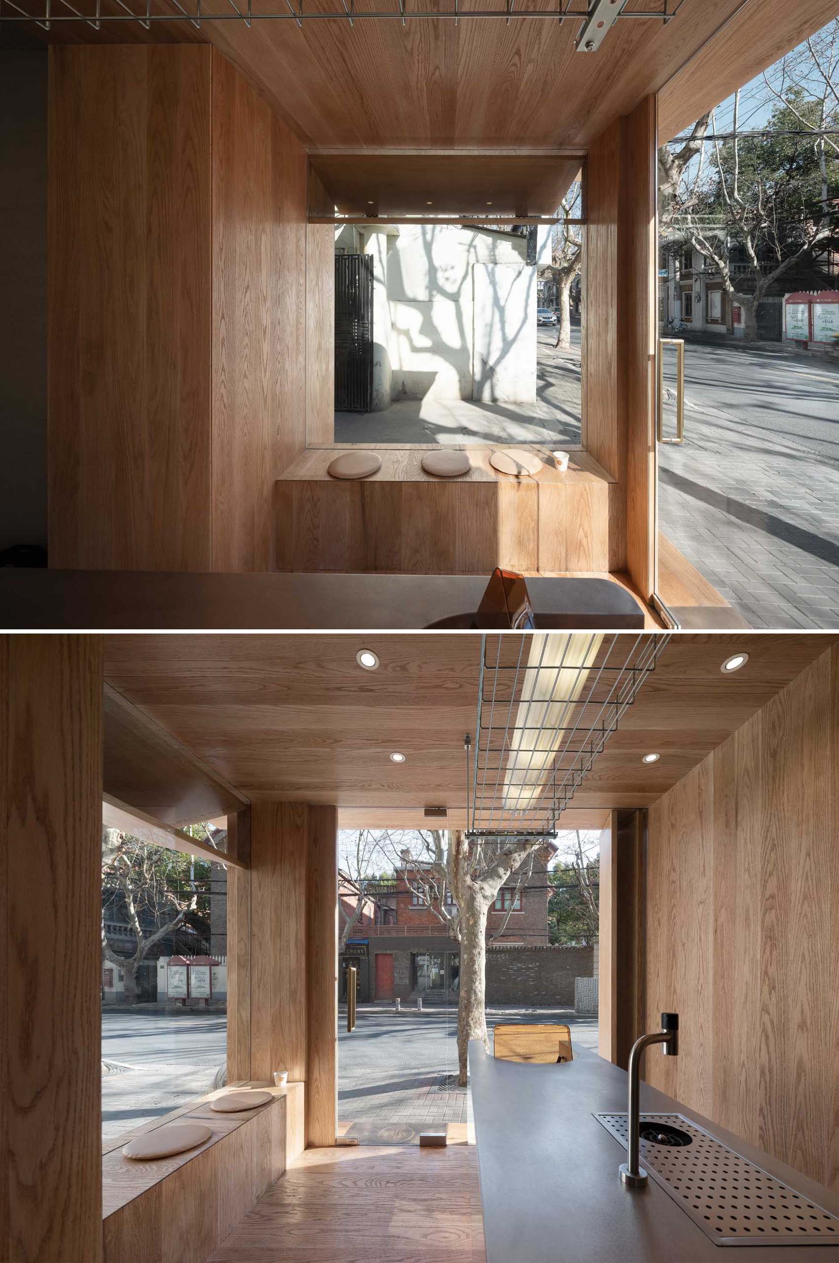 A modern coffee shop with built-in bench seating.