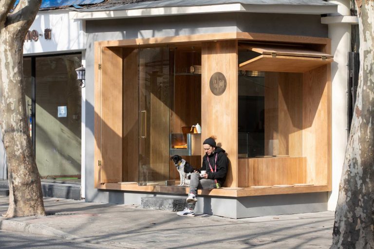 This Café Was Designed Like A Wood Box That Opens To Allow The Coffee Shop To Interact With The Street