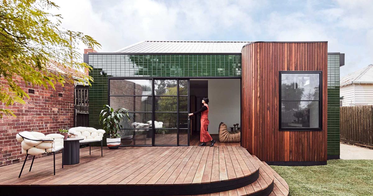 The Glazed Tiles On The Exterior Of This New House Addition Are A