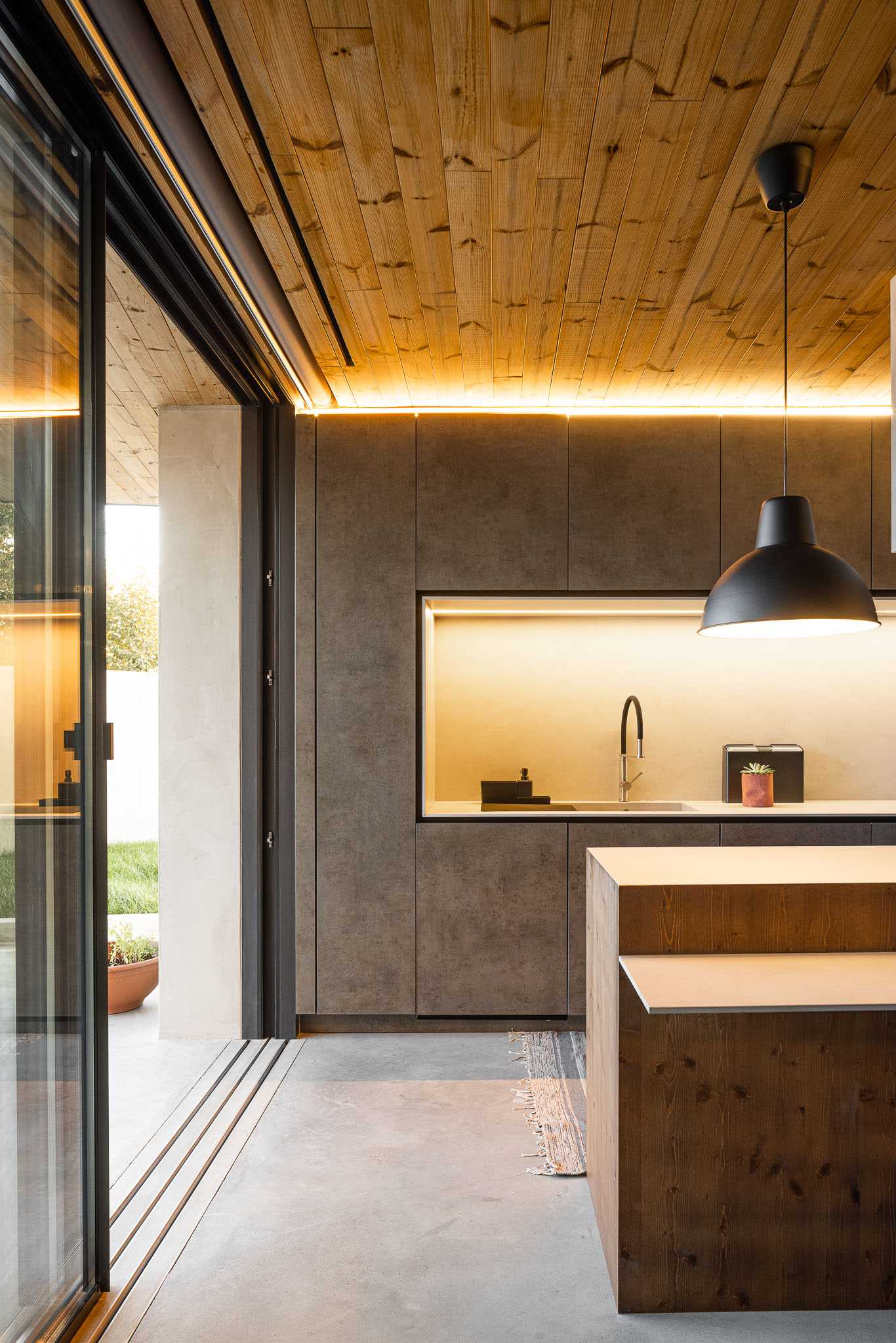 A modern kitchen with hidden lighting.