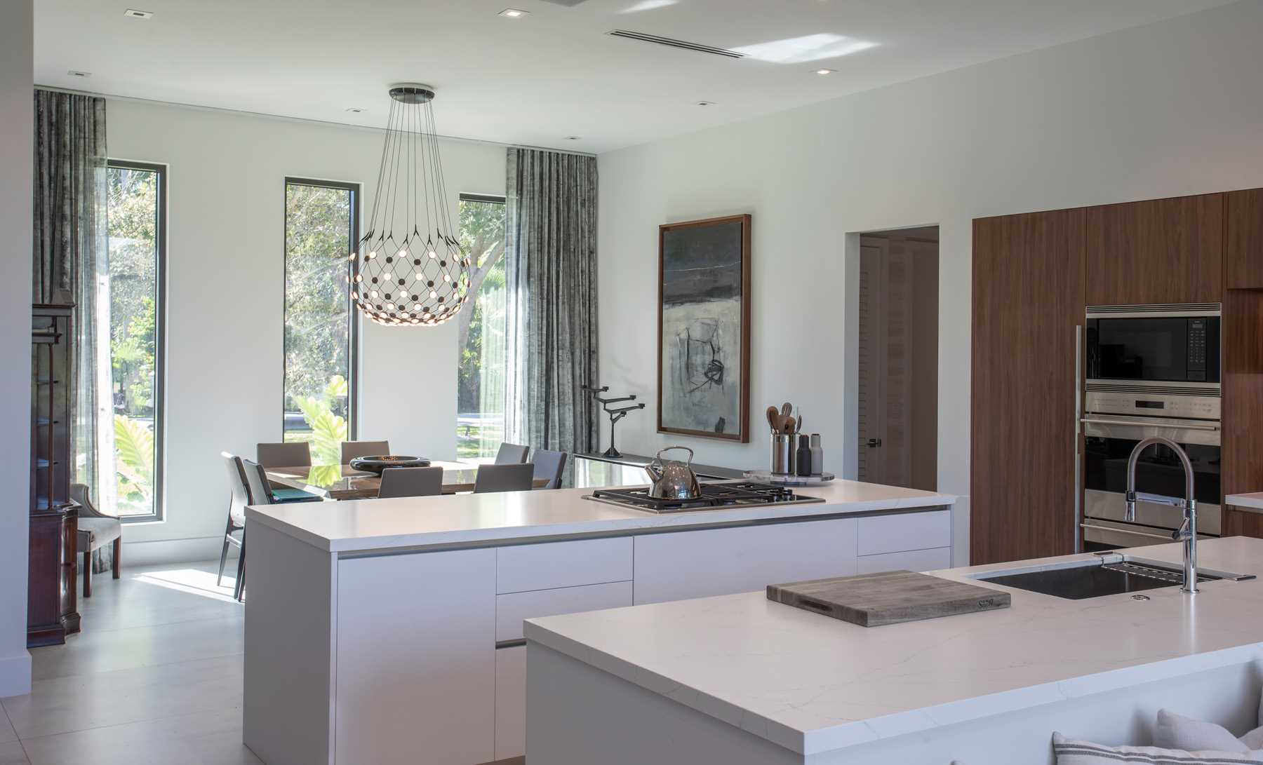 A modern kitchen with two islands.