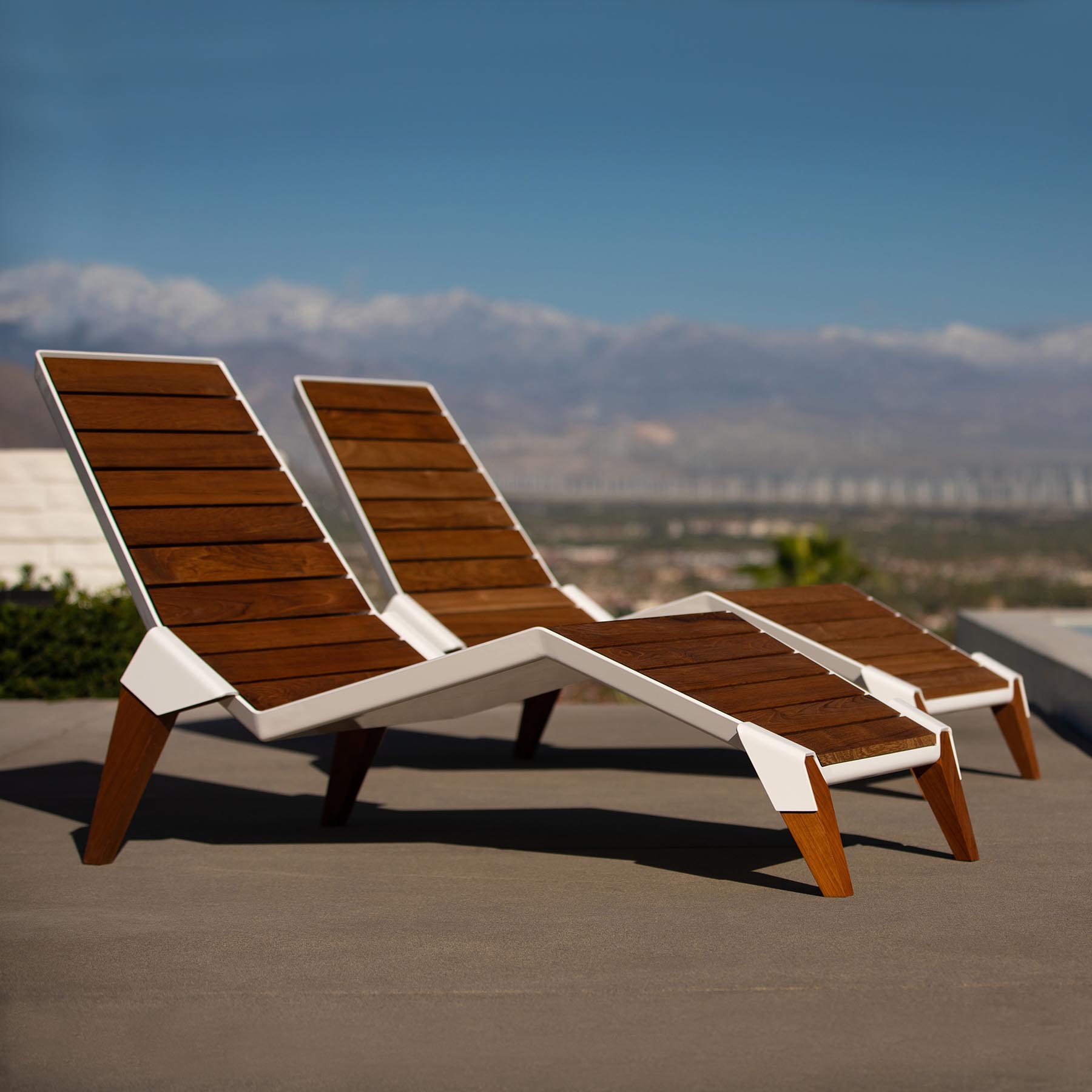 The Arms outdoor lounge chair gains inspiration from the feeling of peace and relaxation. The design was conceived and sketched while overlooking a couple resting on the beach. The angled back legs relate to a human form reminiscent of a person sitting on the ground leaning back with their weight on their arms.