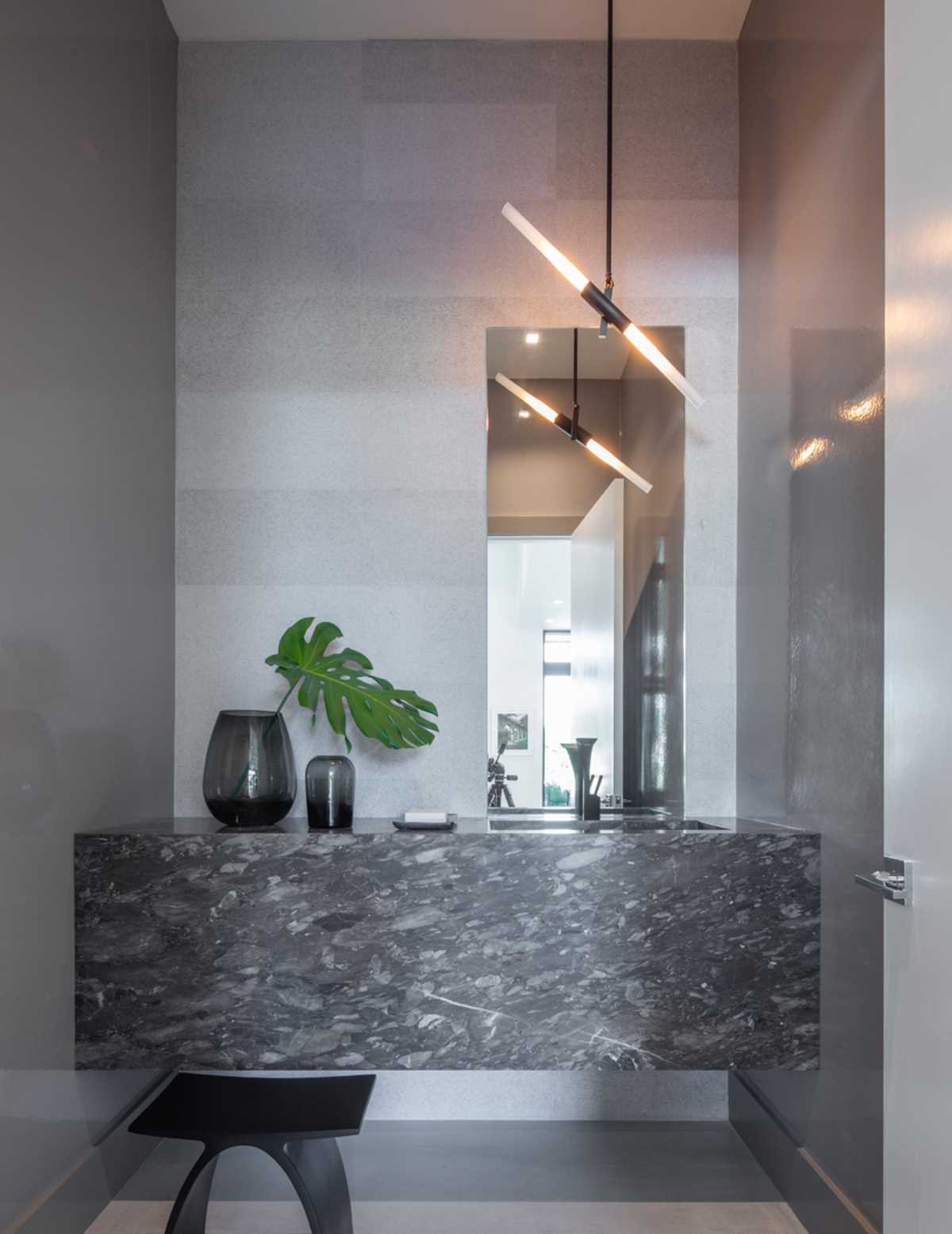 A powder room with a statement vanity.