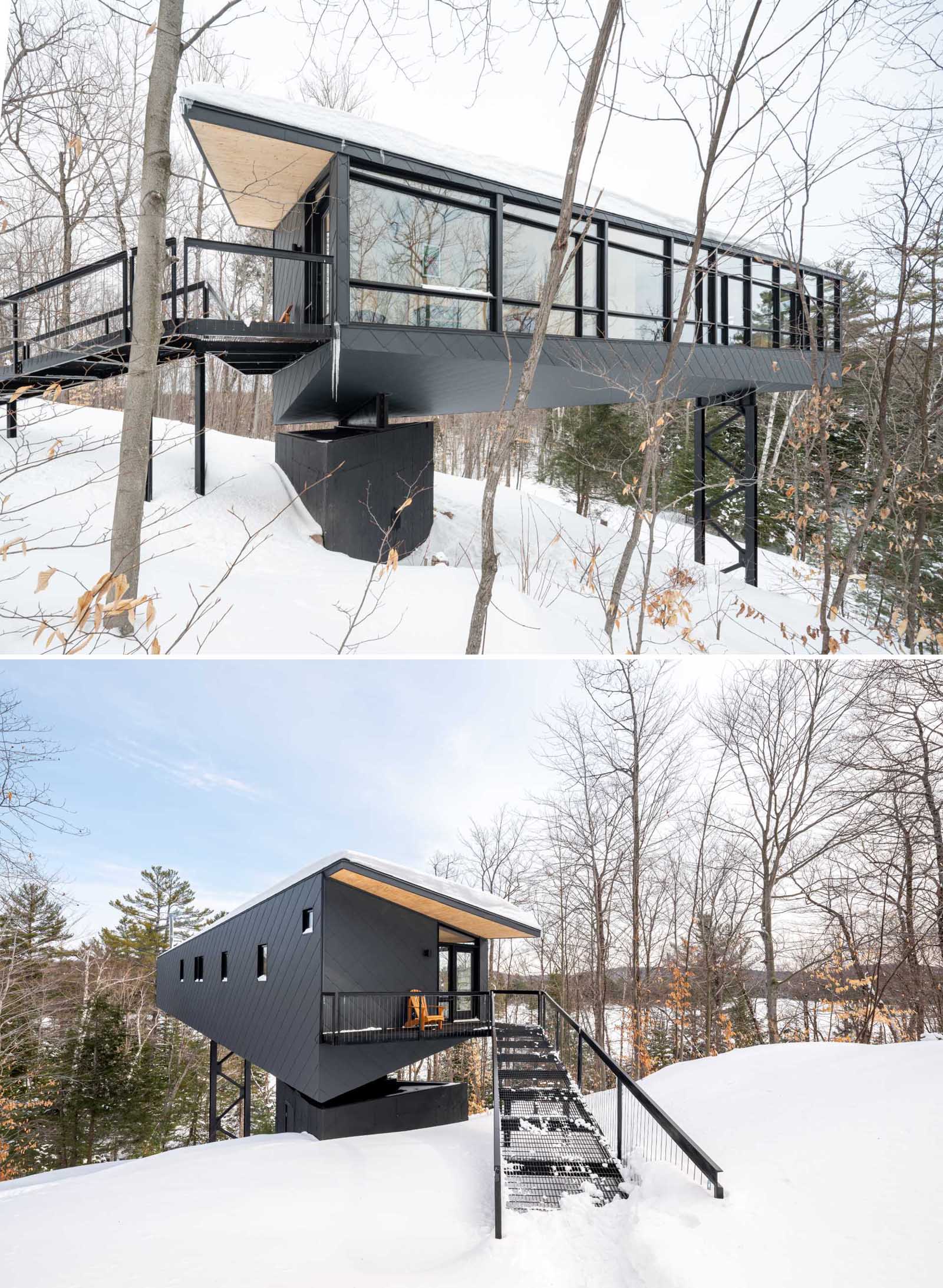 A modern and black elevated cabin.
