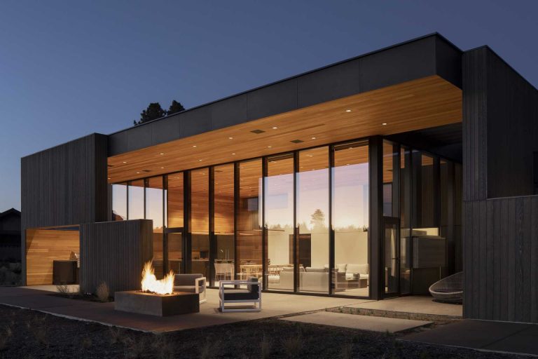 A High Ceiling Covers The Living Room And Kitchen Inside This New House