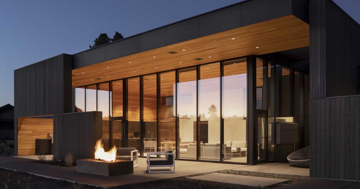 A High Ceiling Covers The Living Room And Kitchen Inside This New House