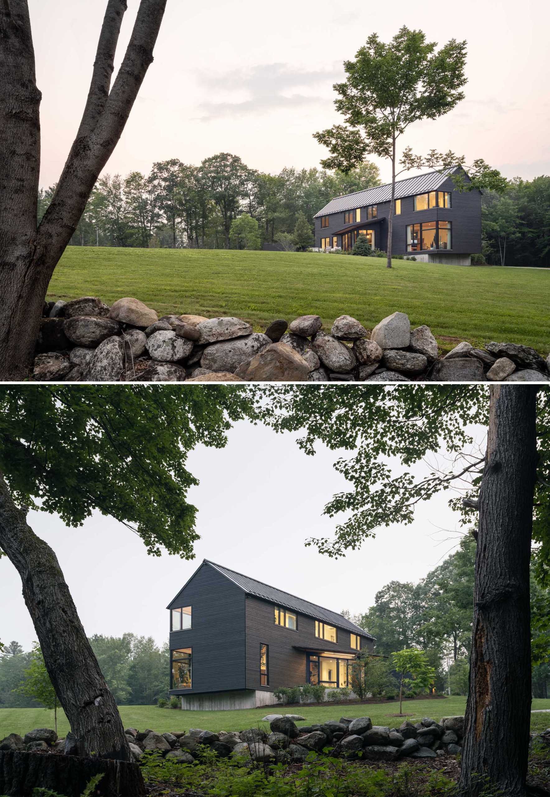 A modern house with a bold exterior clad with black stained wood siding and a standing seam metal roof.