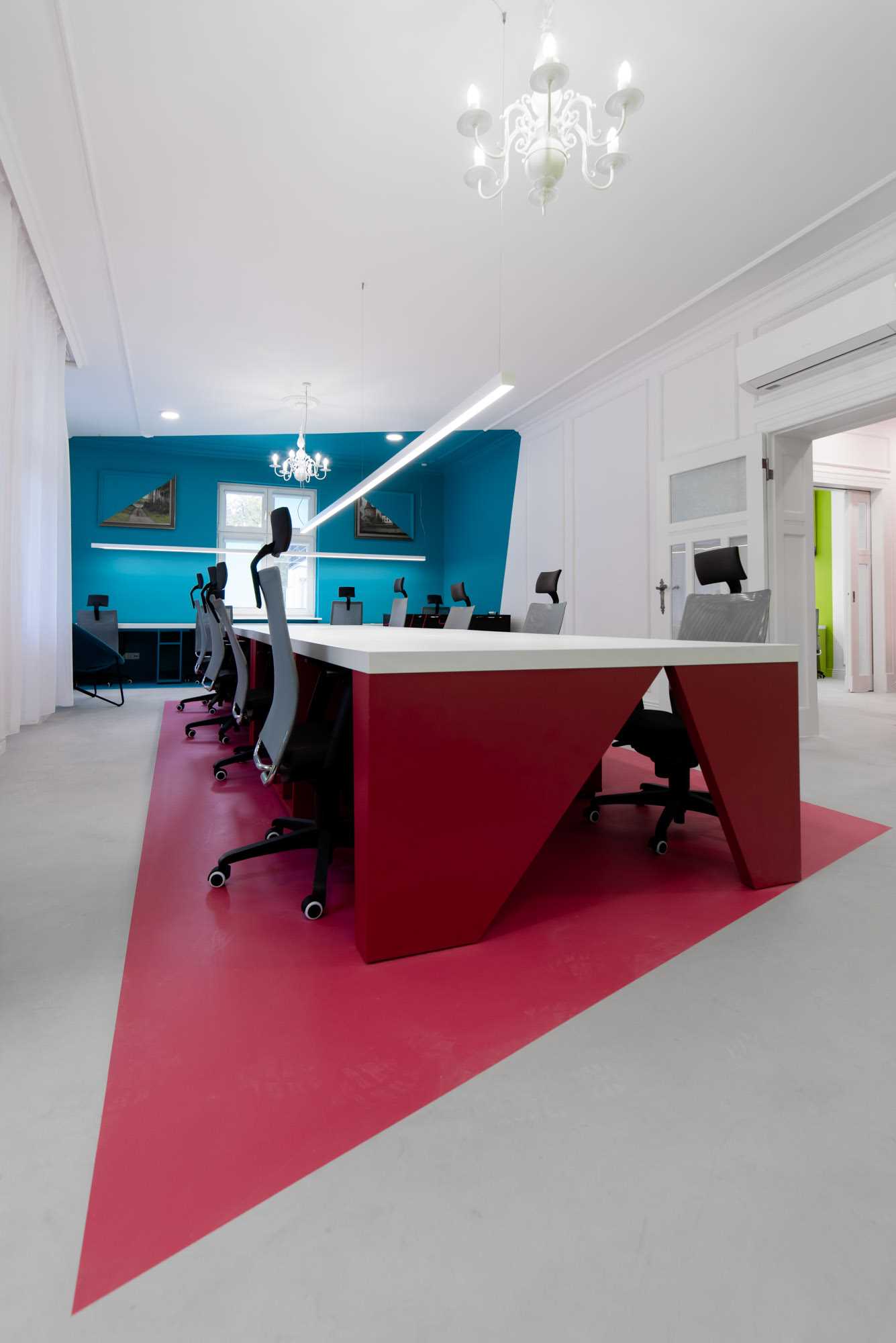 Bold colours in abstract designs create a unique look for this office interior.