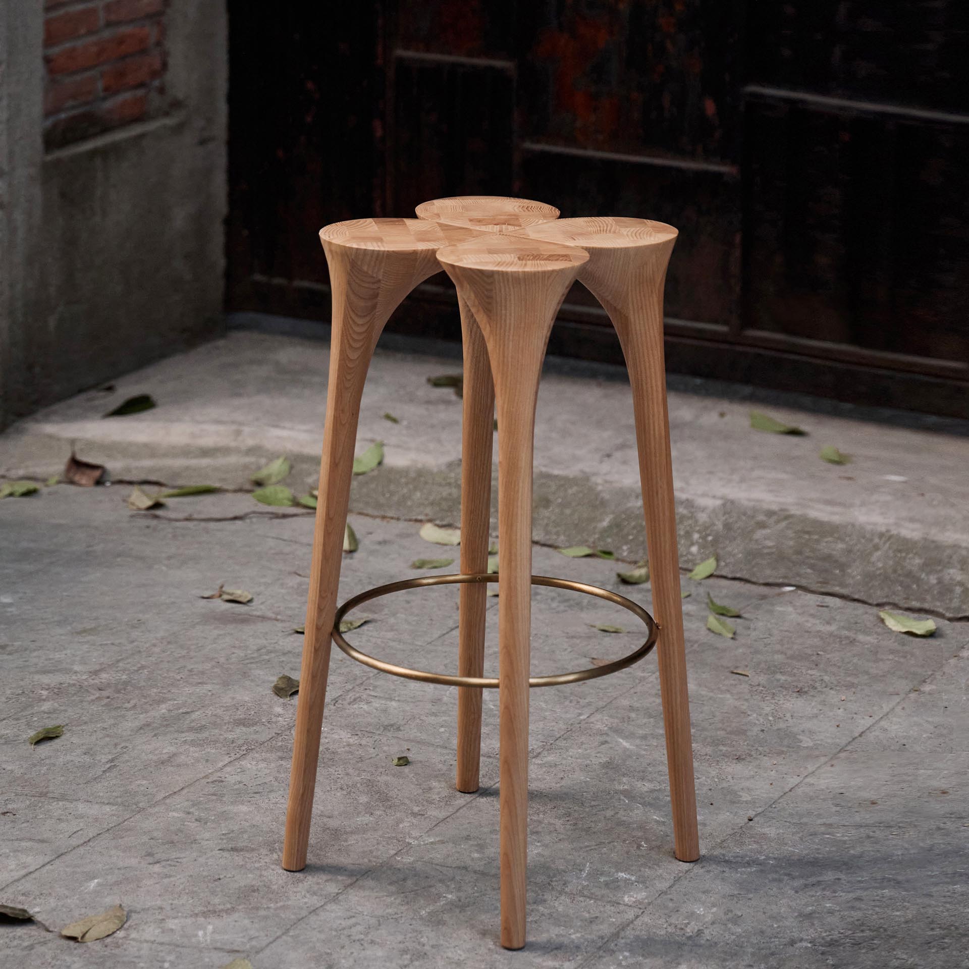 A modern wood stool design.