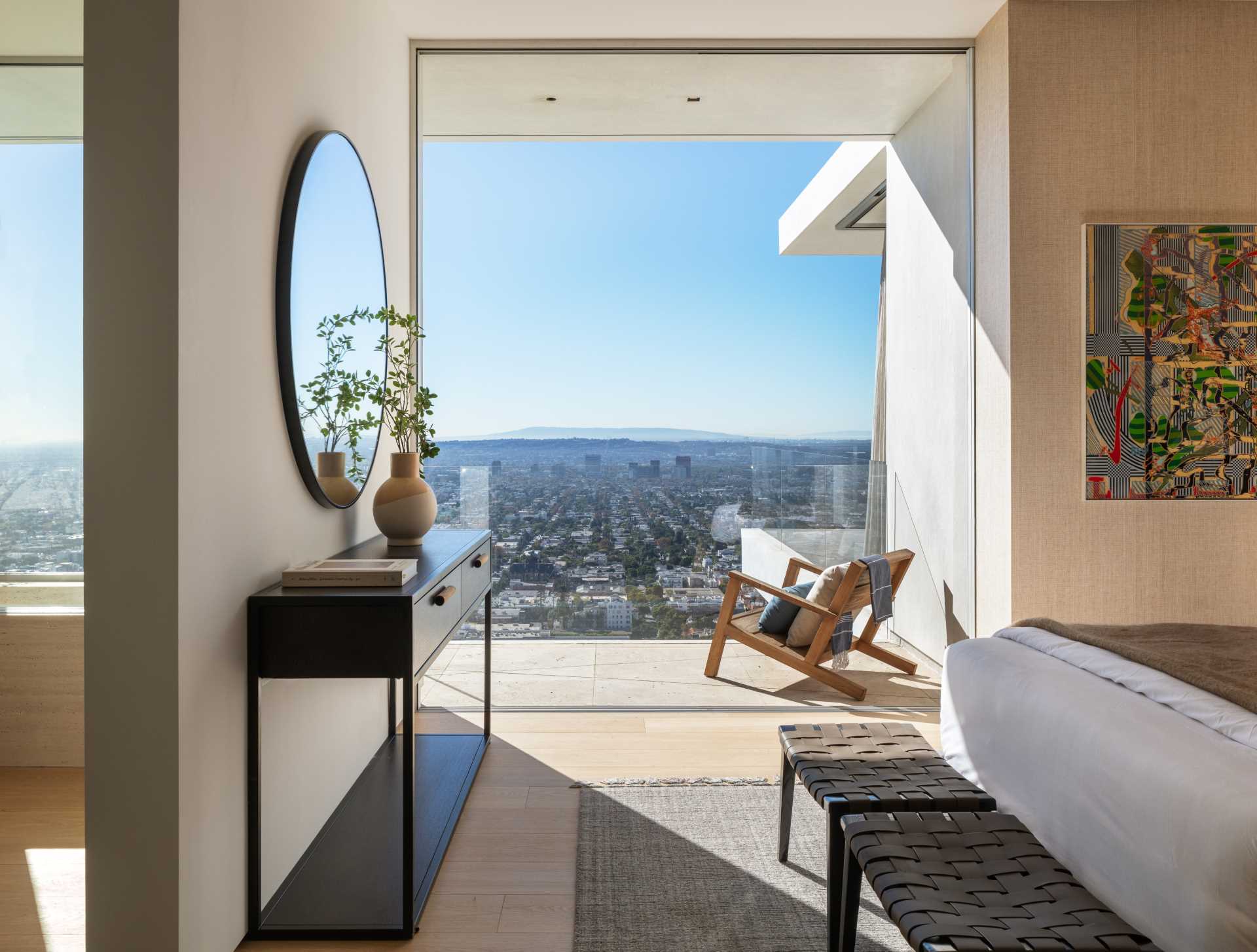 A modern bedroom with a balcony.