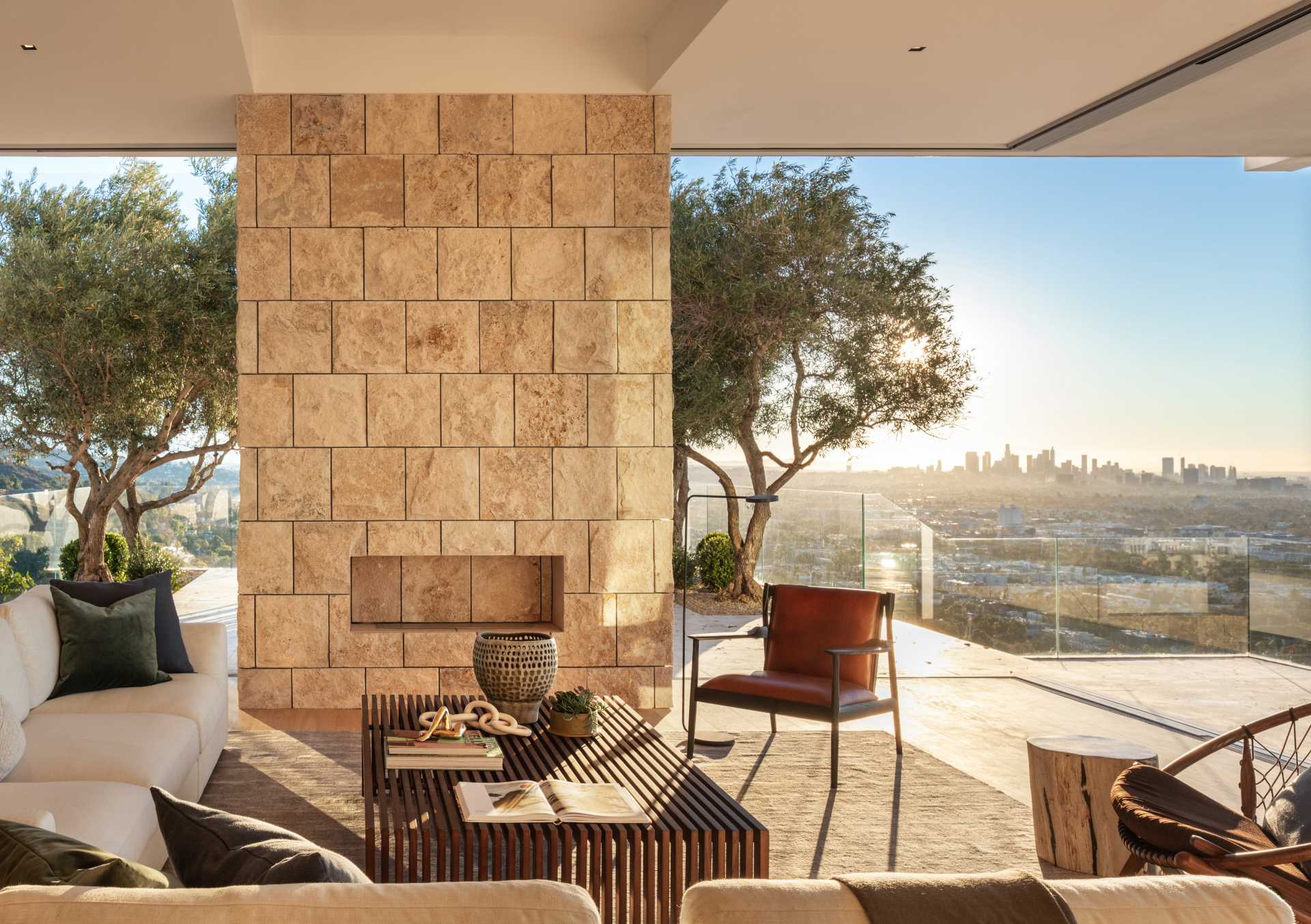 A modern indoor / outdoor living room with connection to the outdoors.