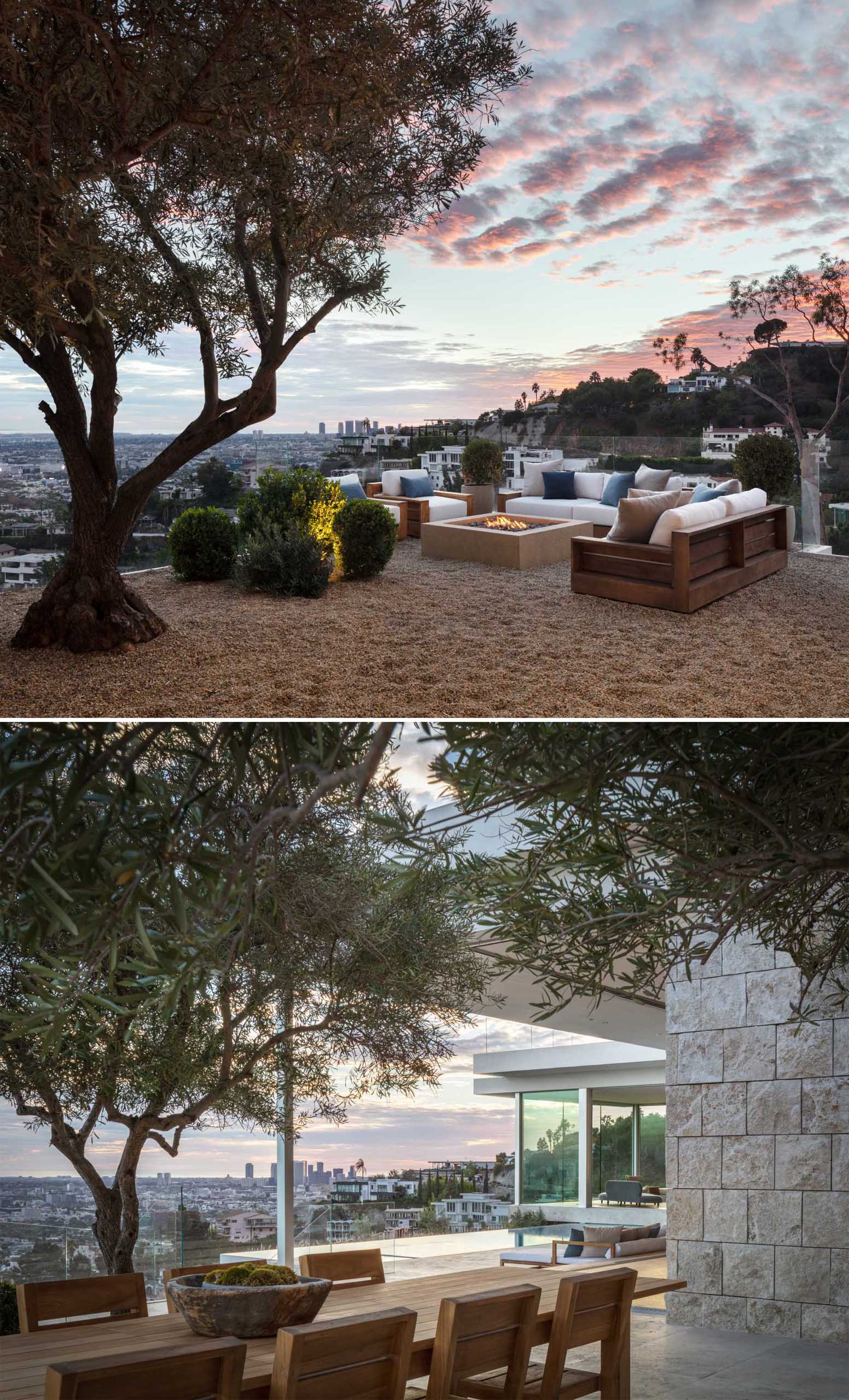 A modern house with an outdoor lounge and fire pit, and an outdoor dining area with olive trees.