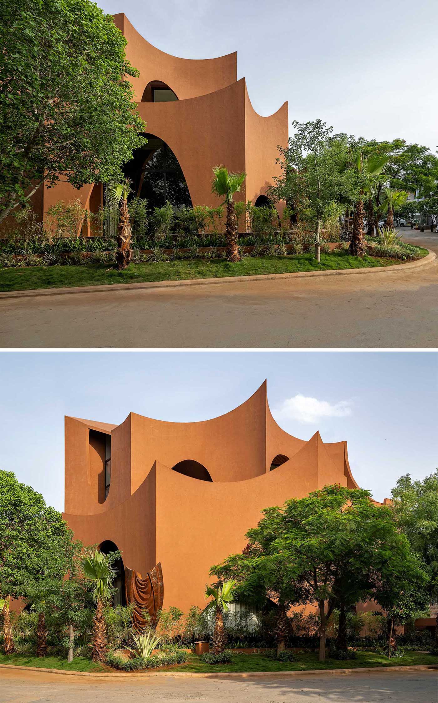 A sculptural modern house with arches scattered throughout its design.
