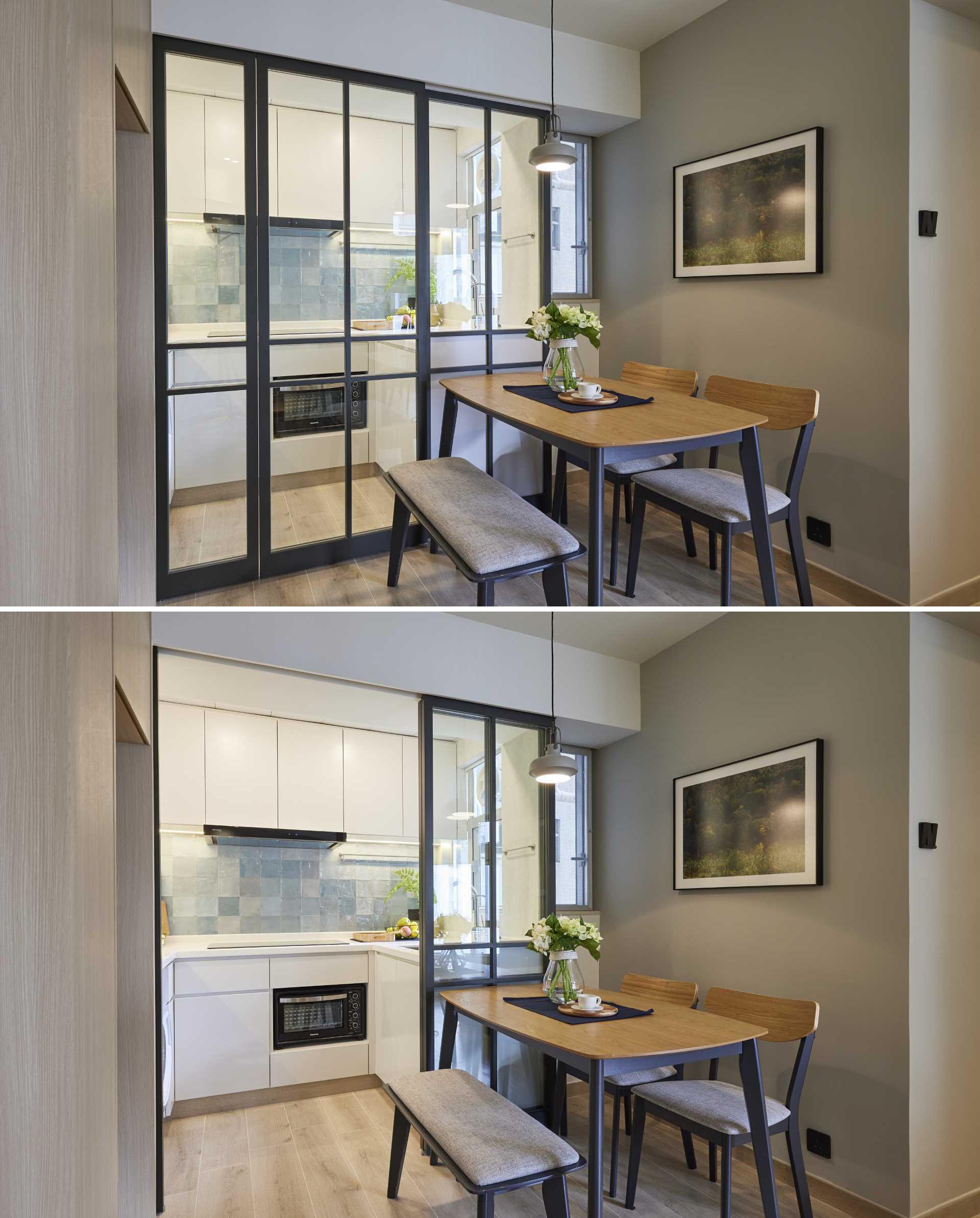 A charcoal-grey metal frame glass sliding door separates kitchen from the dining room, and allows light to flow between the spaces.