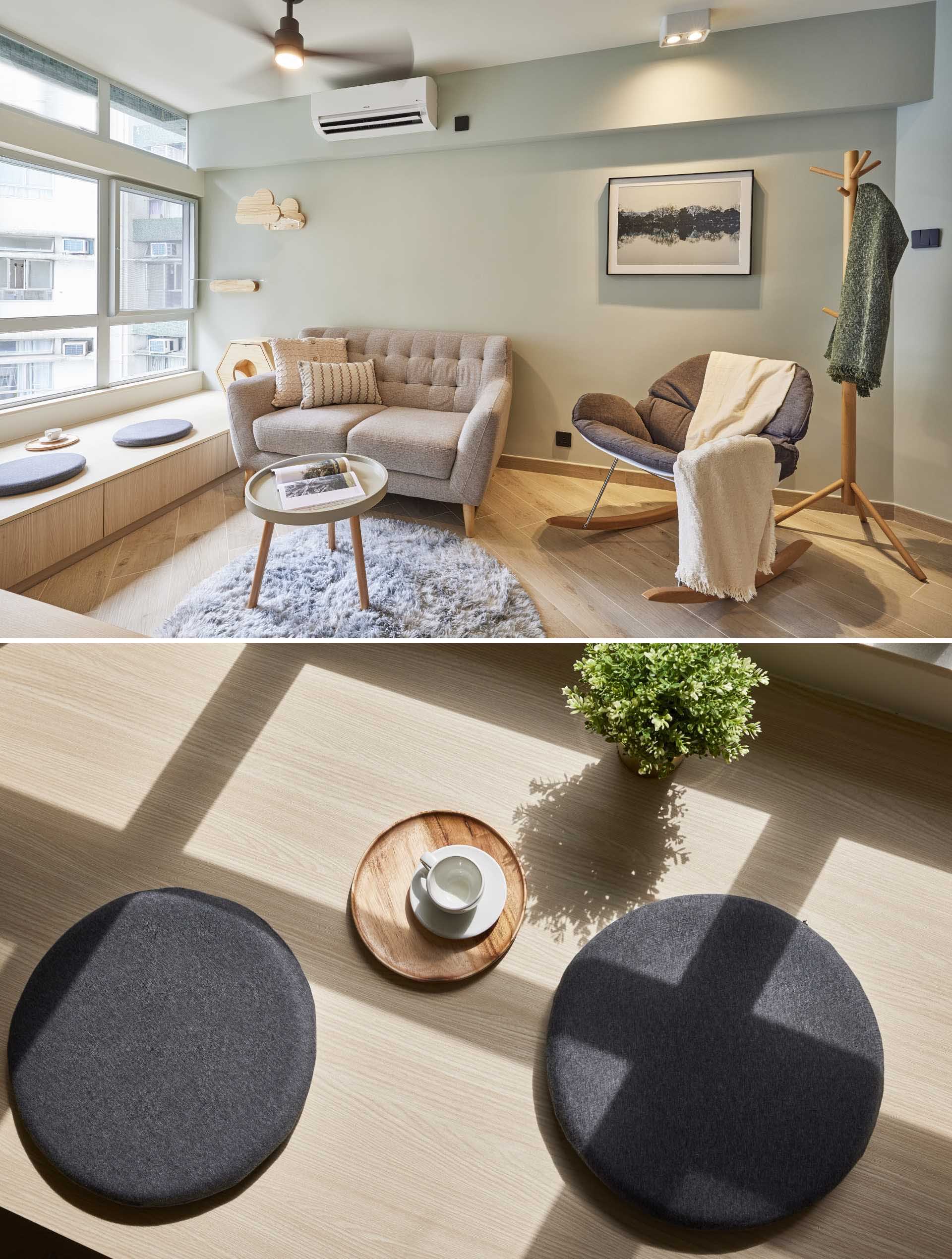 A small living room with a built-in window bench.