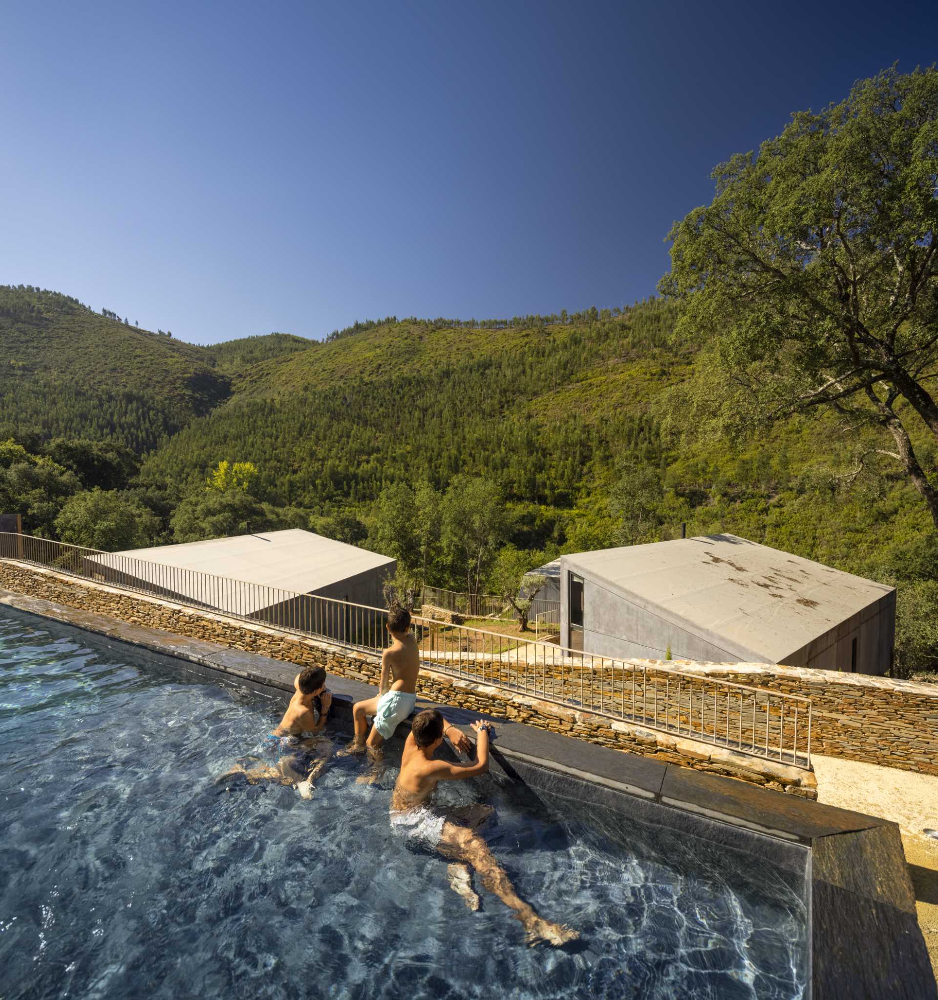 A collection of 11 cabins that enjoy the use of a communal swimming pool.
