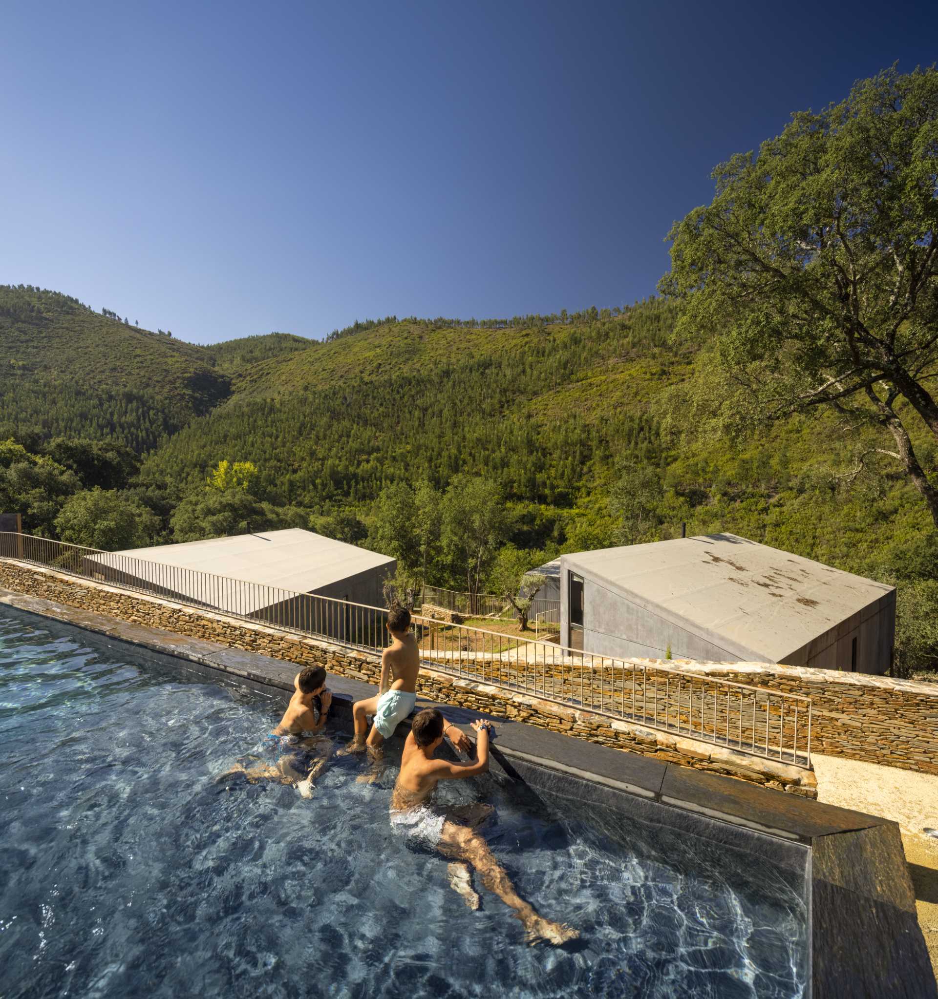 A collection of 11 cabins that enjoy the use of a communal swimming pool.