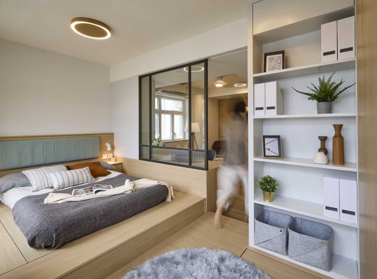 The Internal Window In The Bedroom Of This Small Apartment Allows Light Into The Living Room