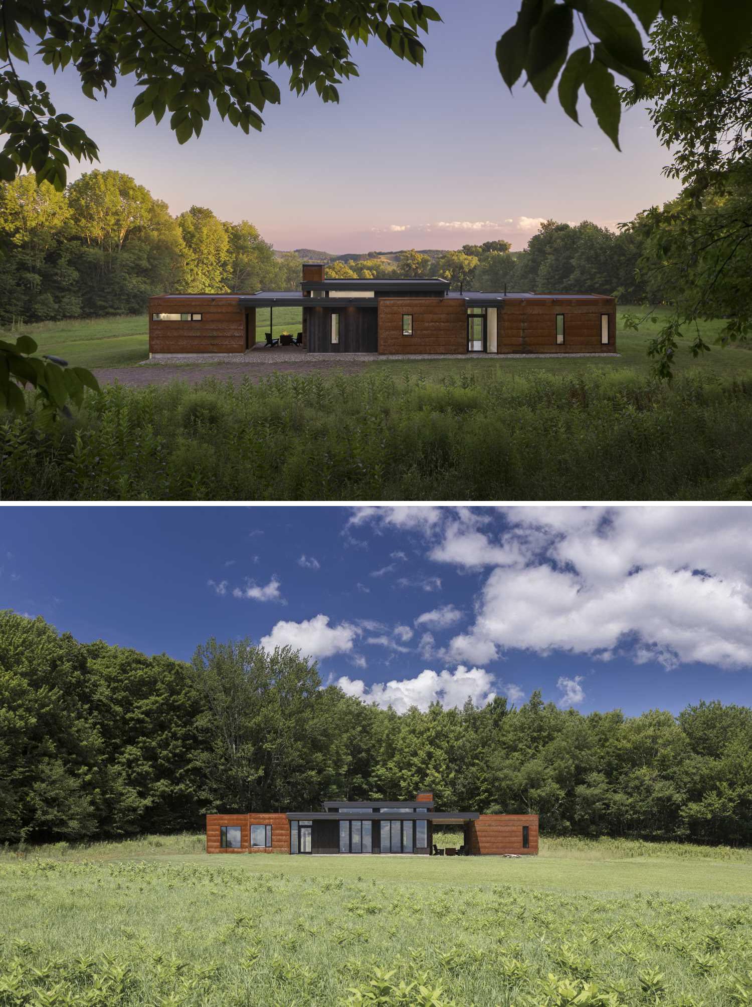 A modern house with a horizontal design, has a weathered steel exterior and black-stained pine siding.