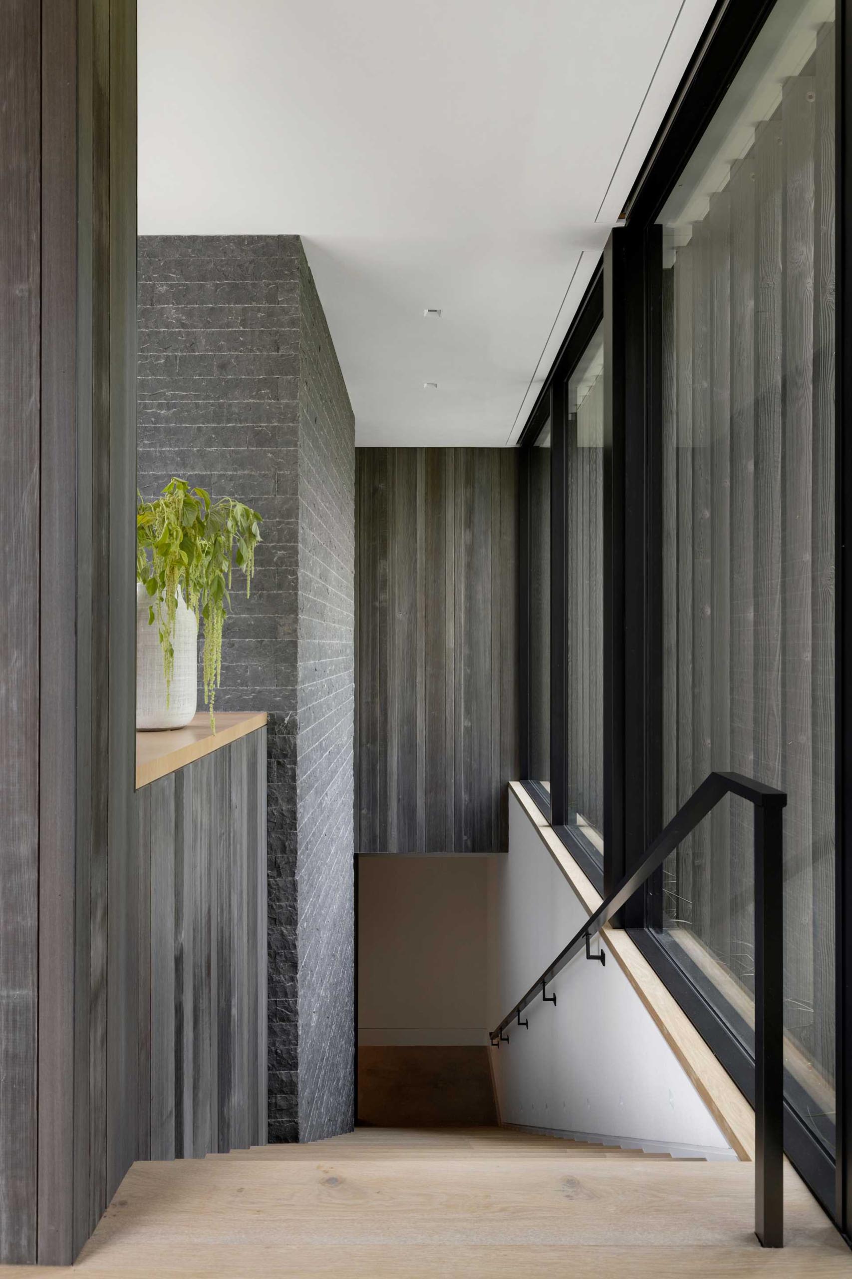 A modern staircase with grey tones.
