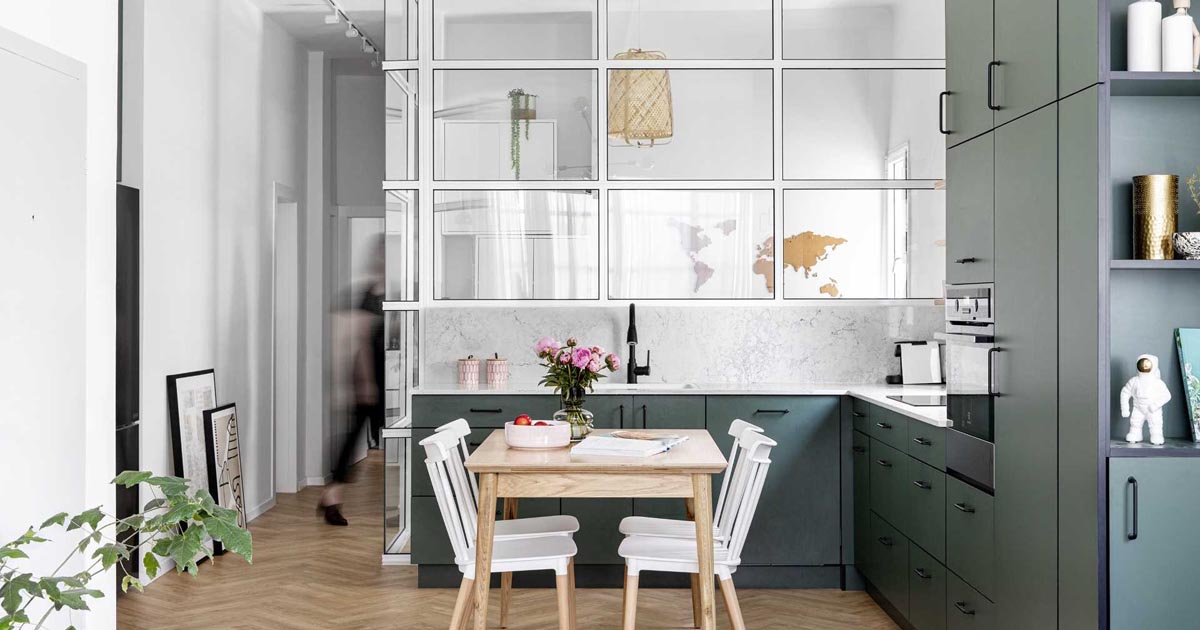 A Glass Enclosed Home Office Is Tucked In Behind The Kitchen In This Apartment