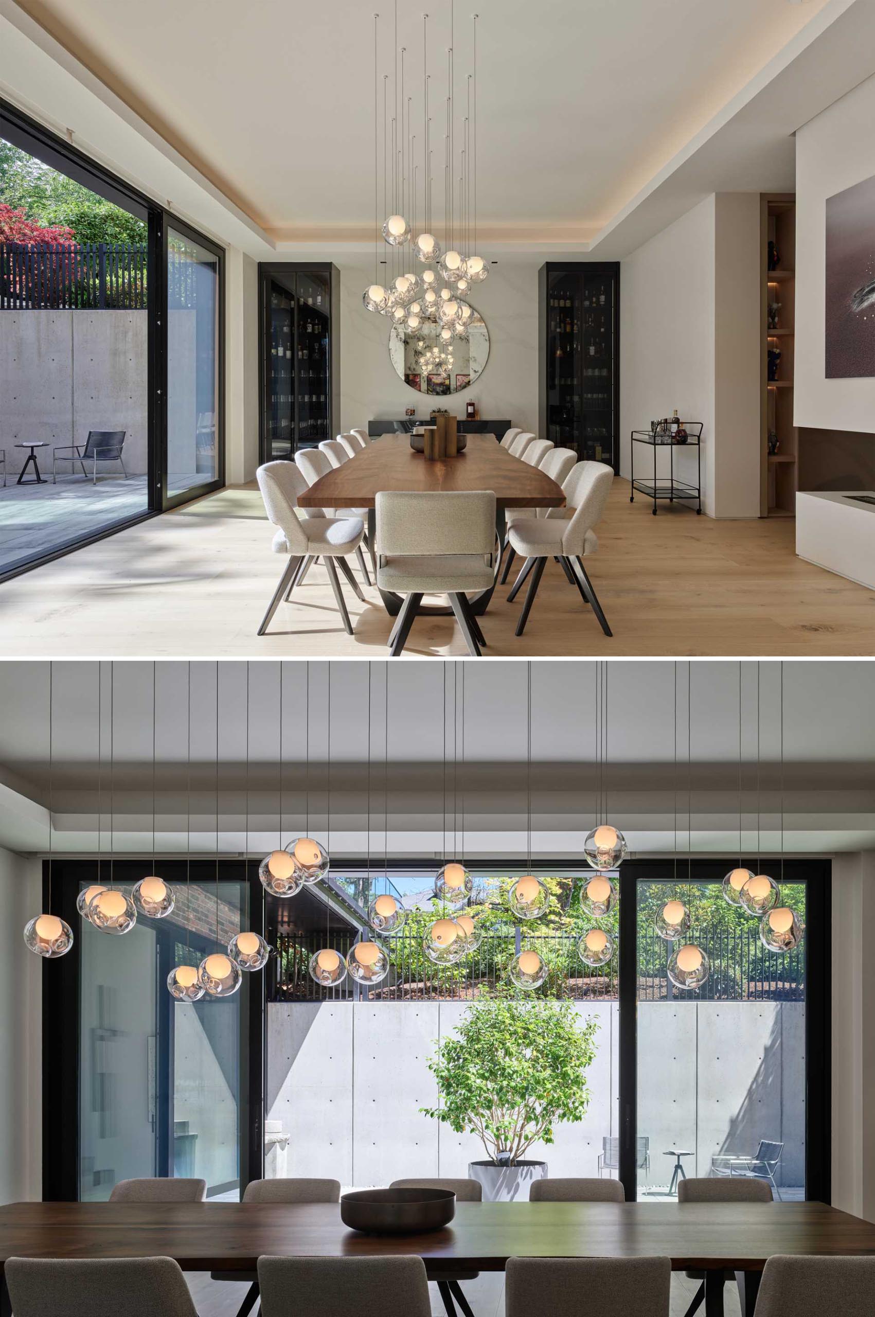 A modern and formal dining room with glass doors that open to a patio.