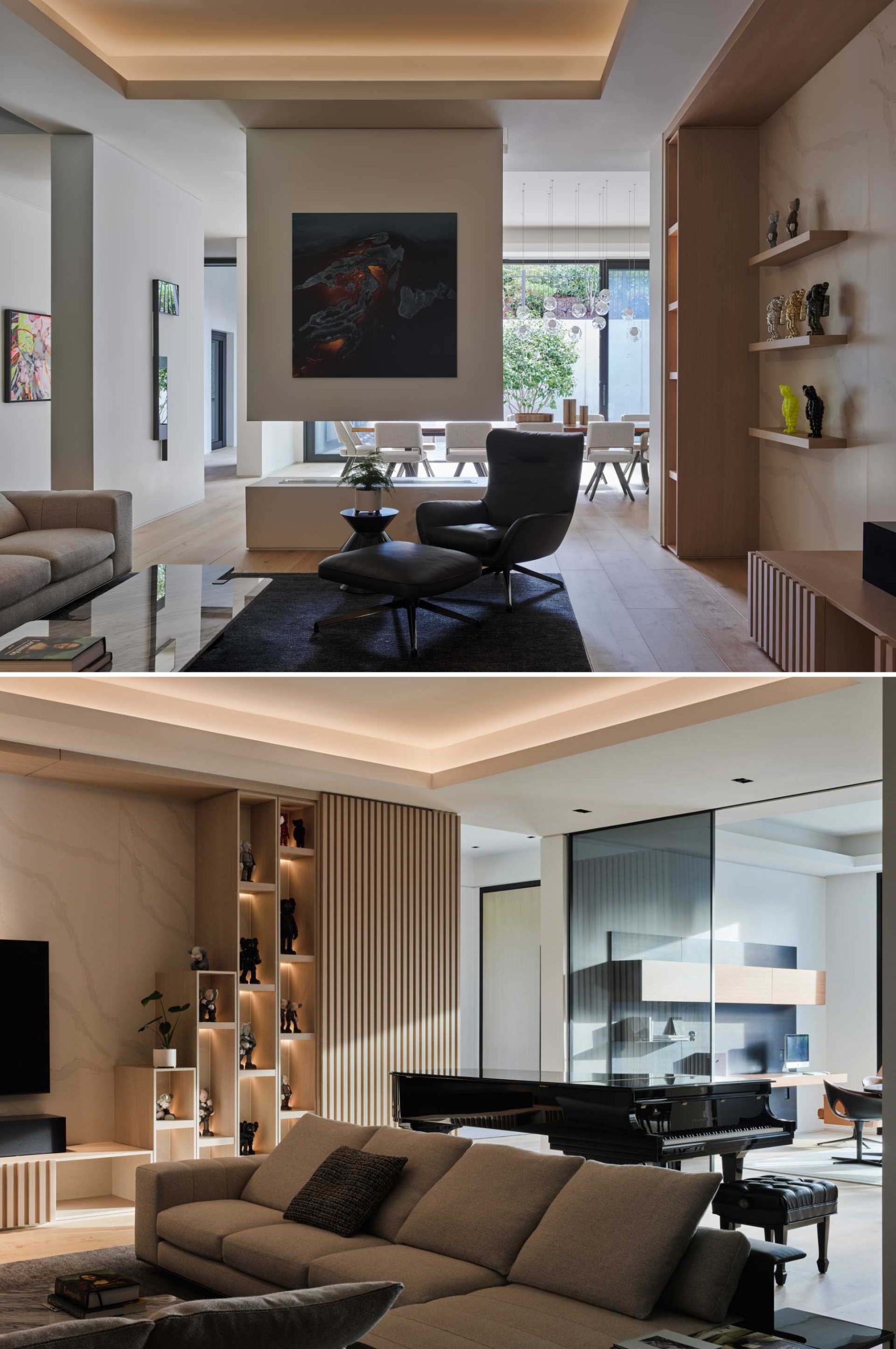 This modern living room includes display shelves, and a fireplace at one end. The other end is home to a piano.
