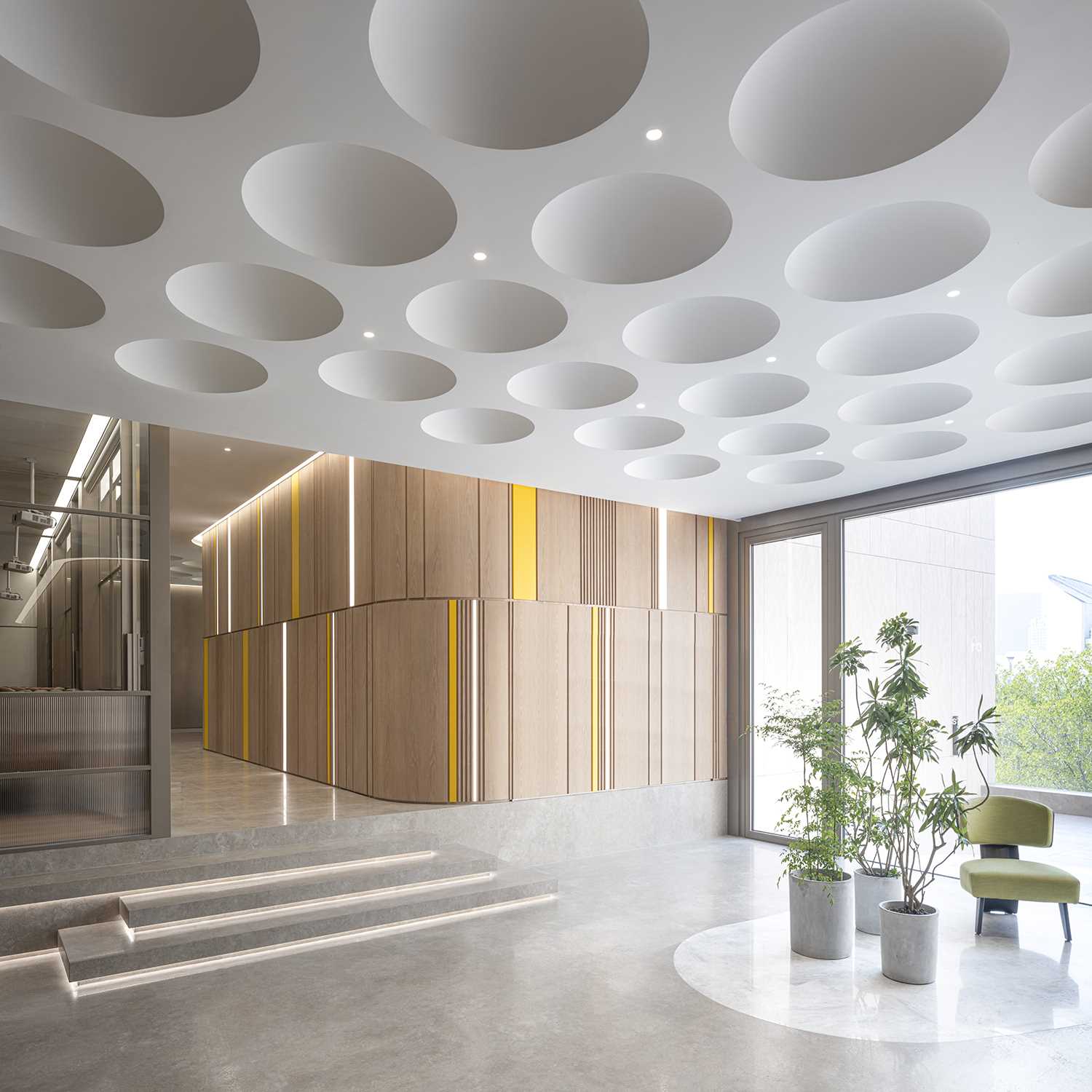 A modern and sculptural ceiling inspired by the dimples on a gold ball.