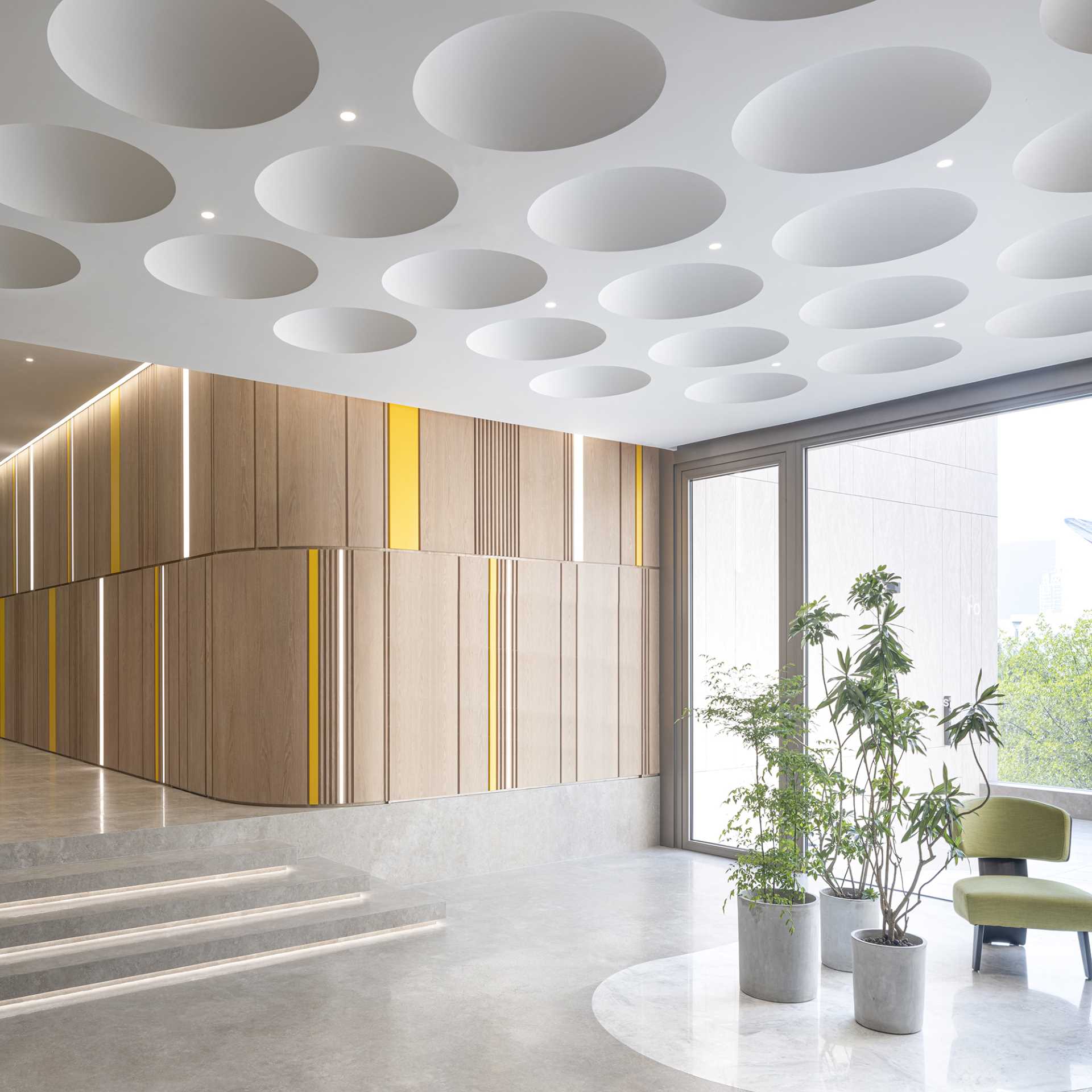 A modern and sculptural ceiling inspired by the dimples on a gold ball.