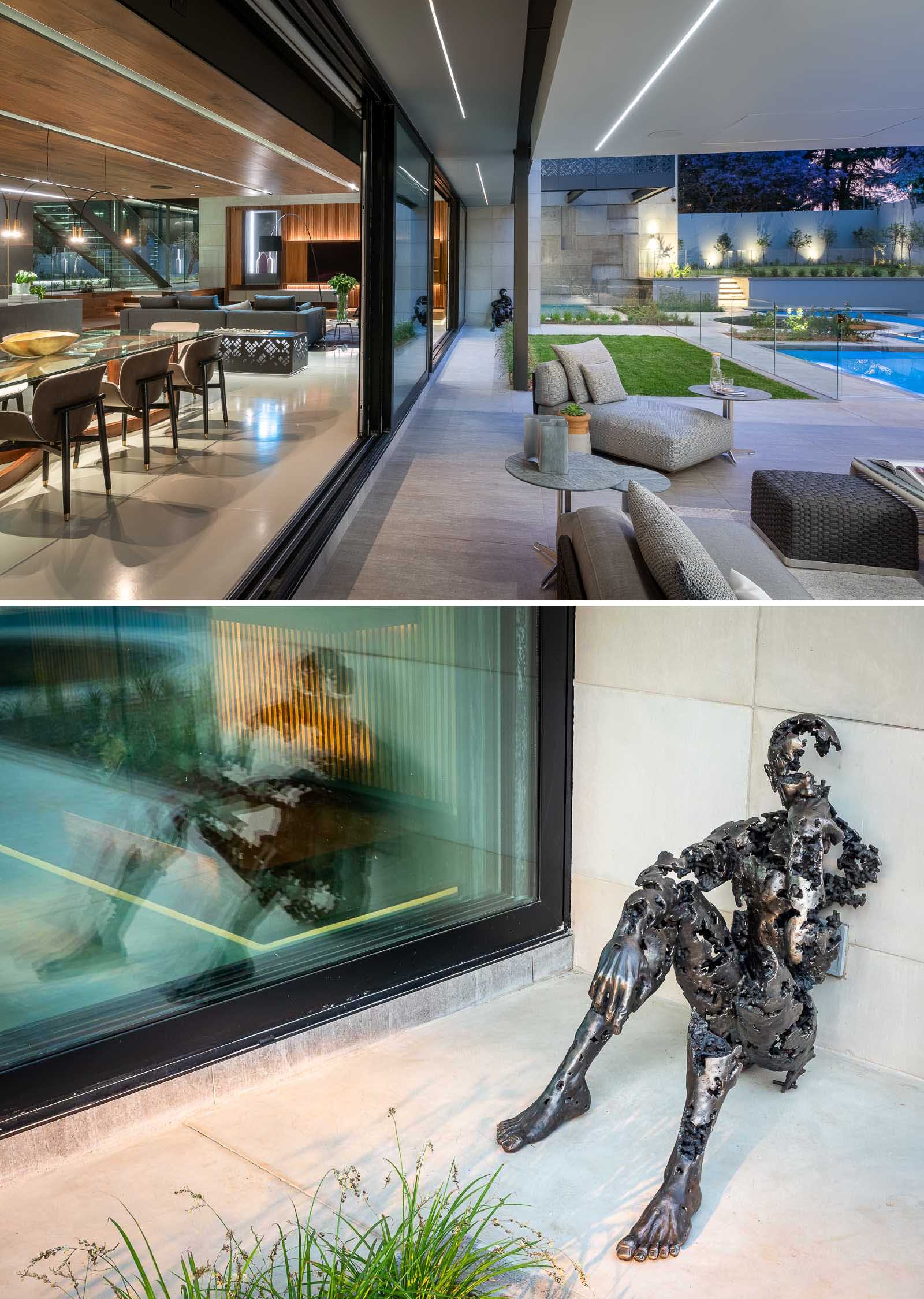 A modern house with a collection of sculptures by artist Regardt van der Meulen.