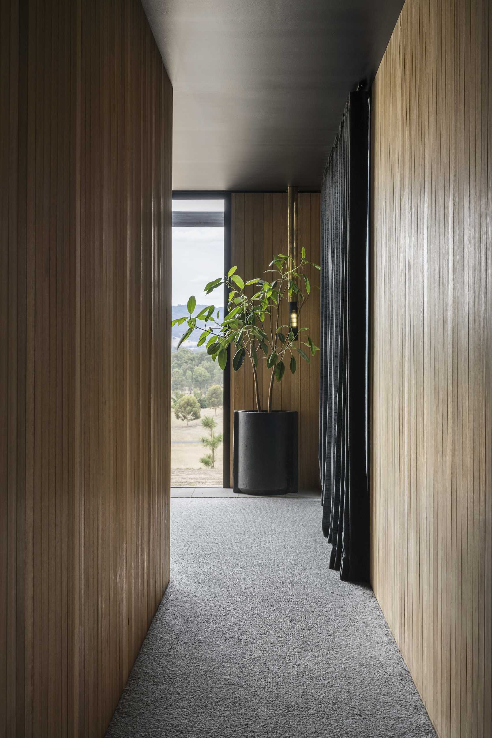 Tile flooring transitions to carpet in this bedroom for a softer feeling underfoot.