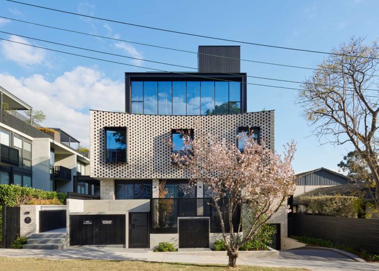 A Curved Brick Facade Presents A Contemporary Face For This Collection Of Townhomes