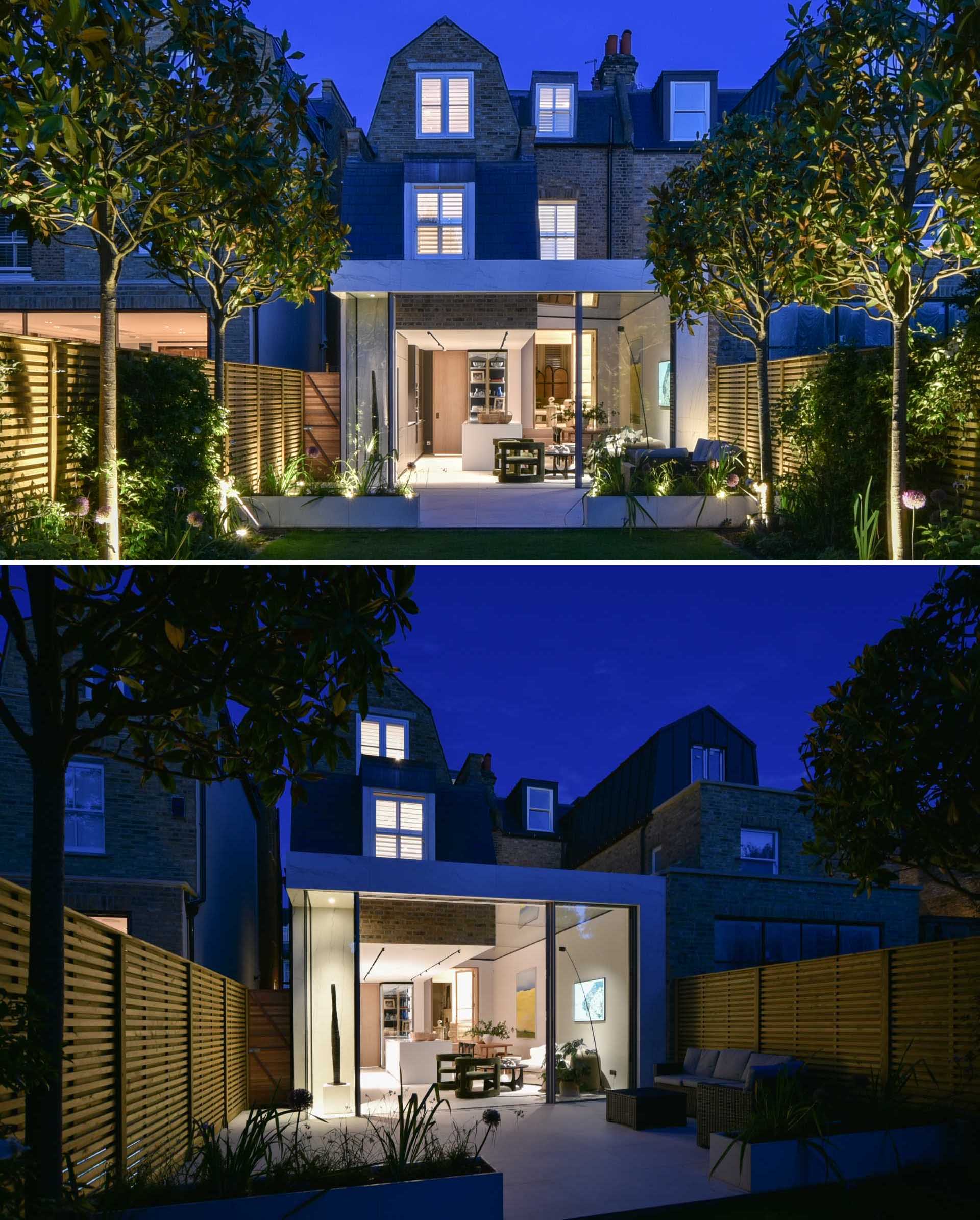 A modern extension with a large skylight that adds natural light to the kitchen, dining area, and living room.