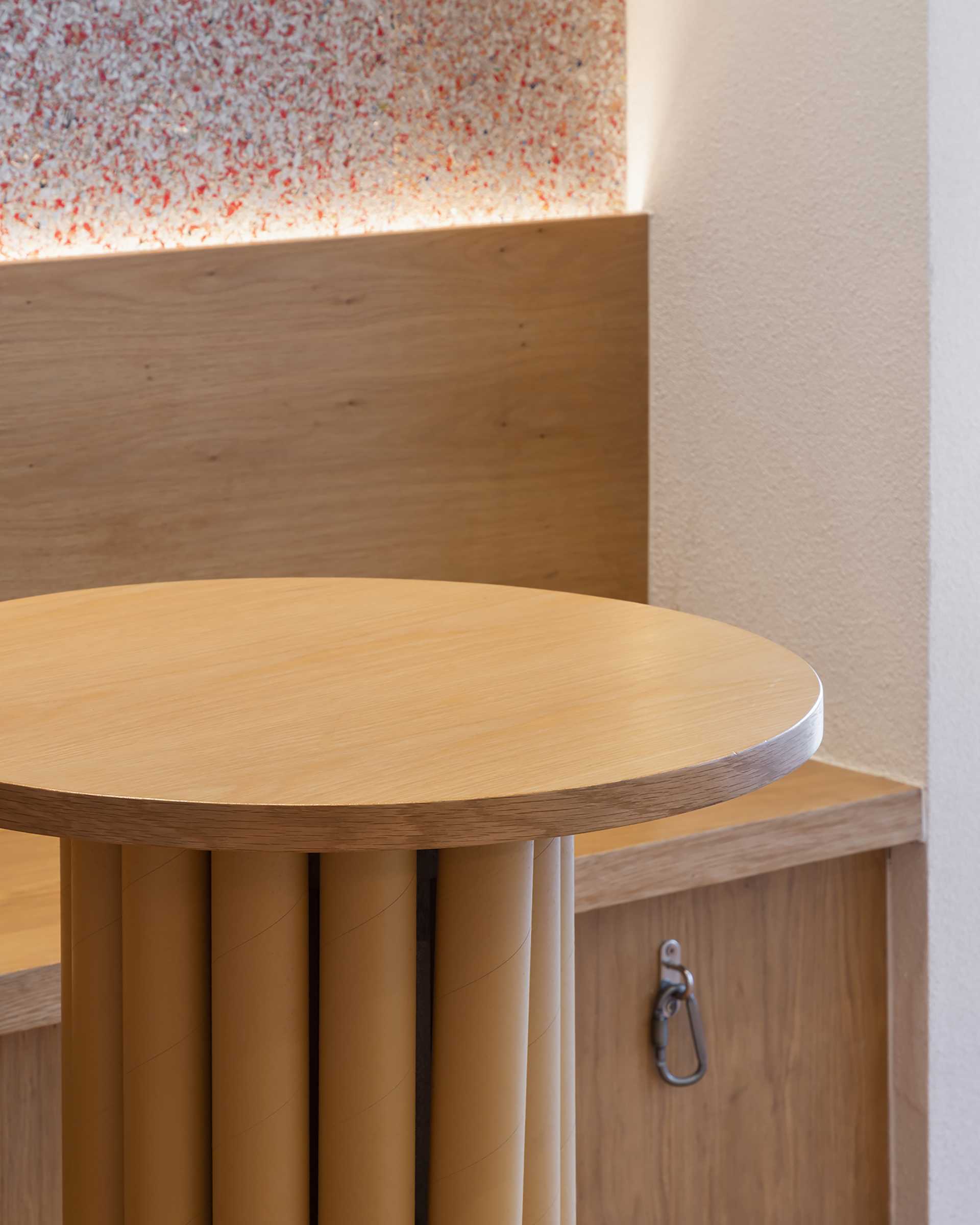 Wood banquette seating with hidden lighting.