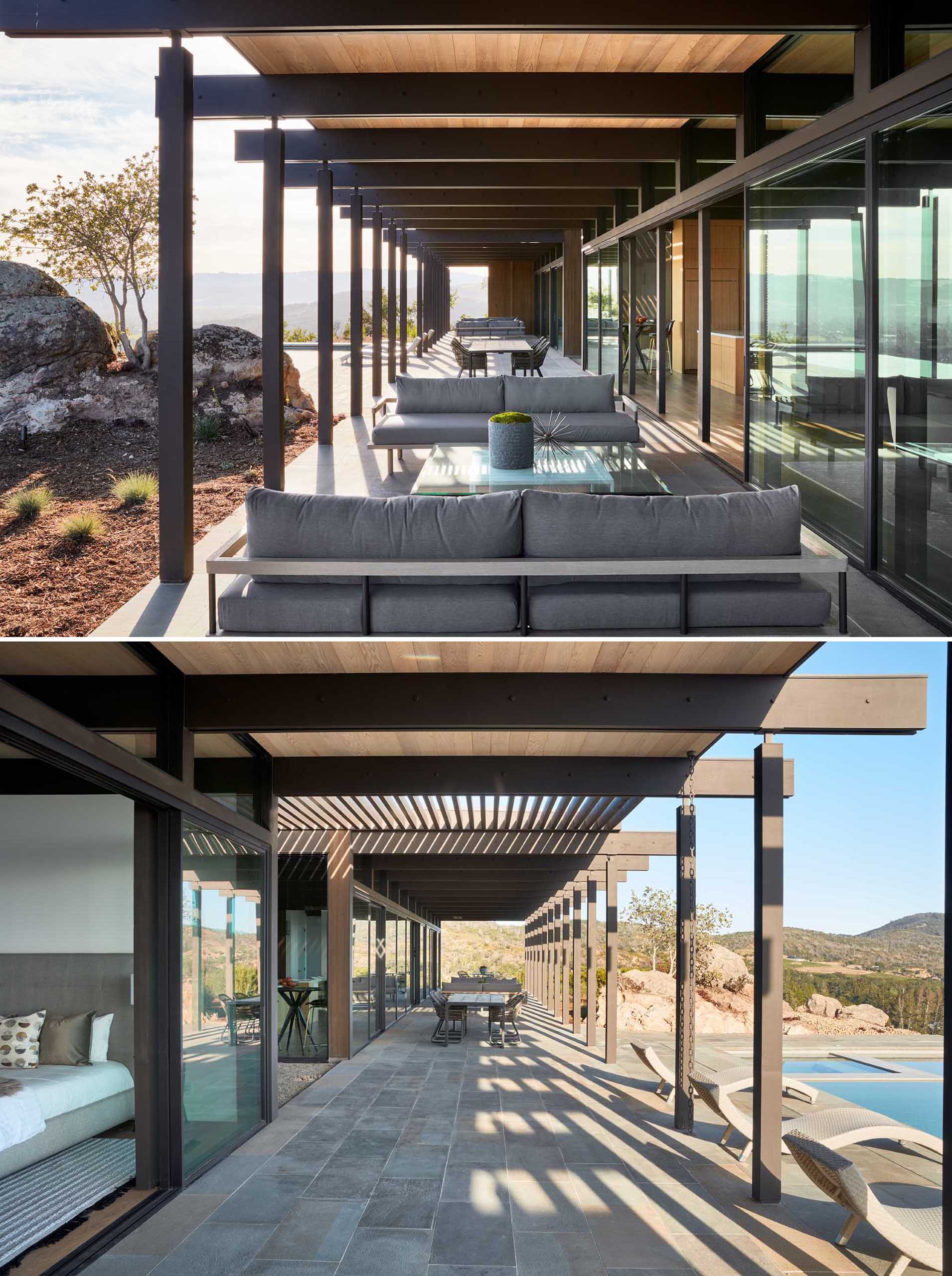 The kitchen, dining, and living spaces of this mid-century inspired home, all open up to a long covered patio, where there's multiple sitting areas, and an additional dining area.