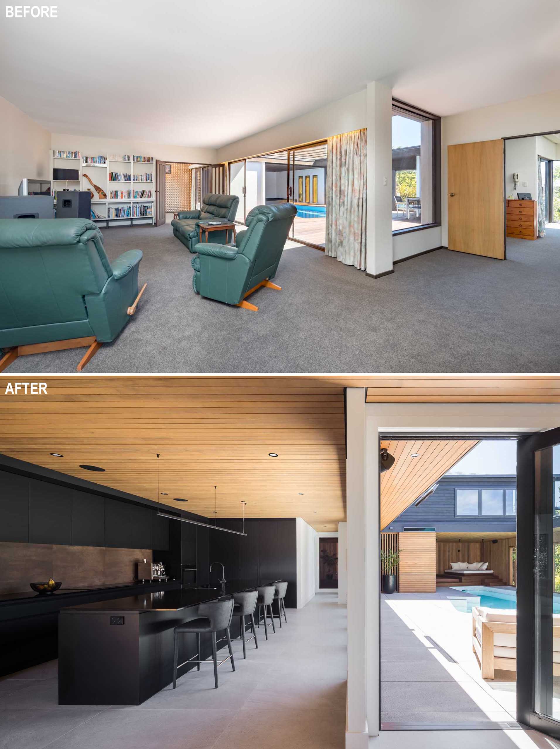 Before & After - A modern black kitchen with minimalist cabinets, a long island, and a wood ceiling.