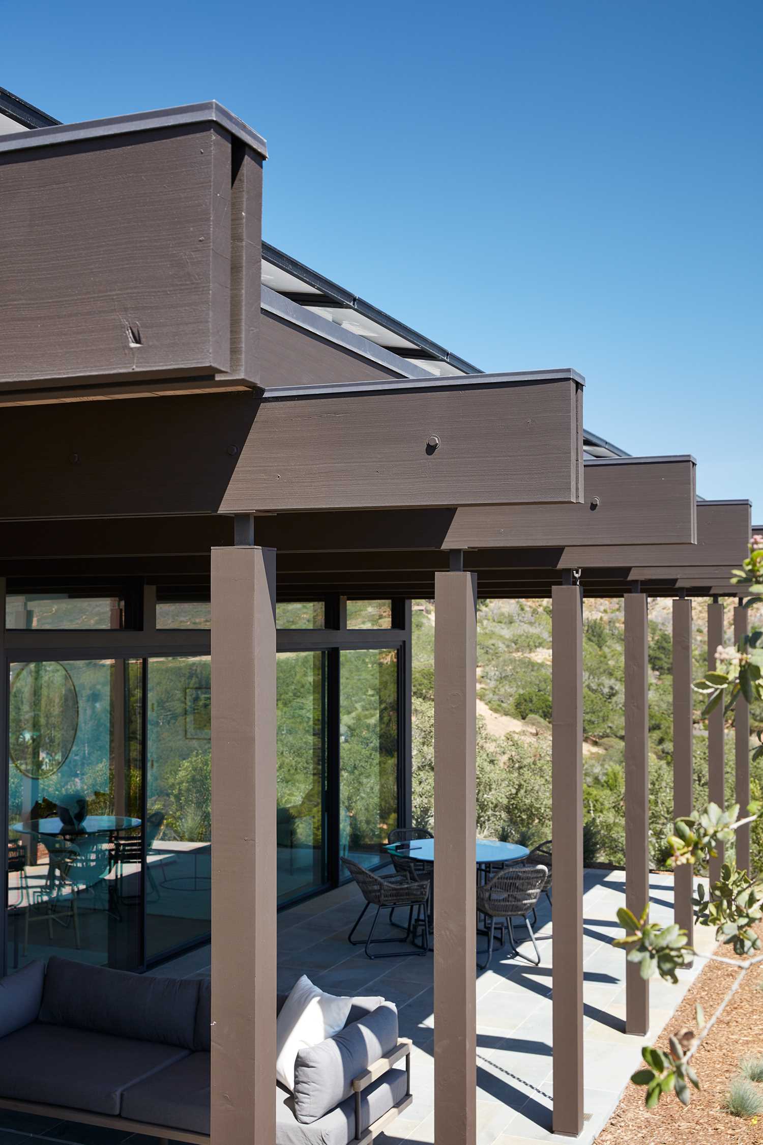 The post and beam structure of a new home, whose design was inspired by mid-century modern houses.