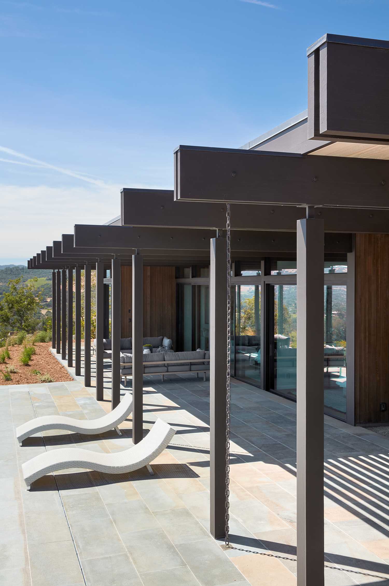 The post and beam structure of a new home, whose design was inspired by mid-century modern houses.