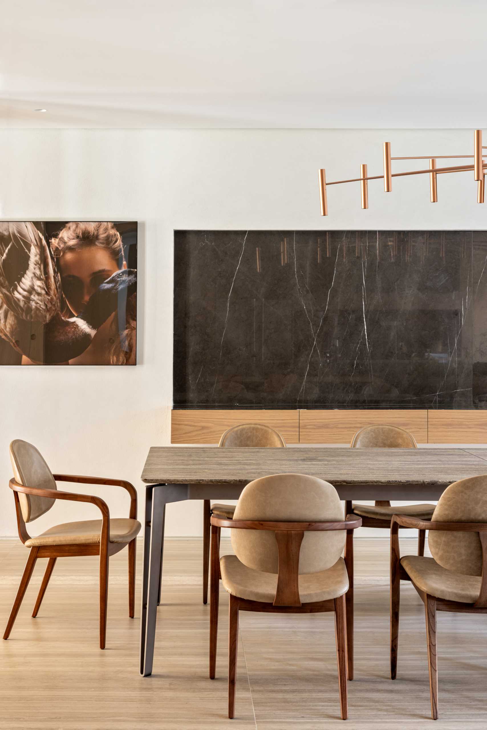 A formal dining room with a floating sideboard.