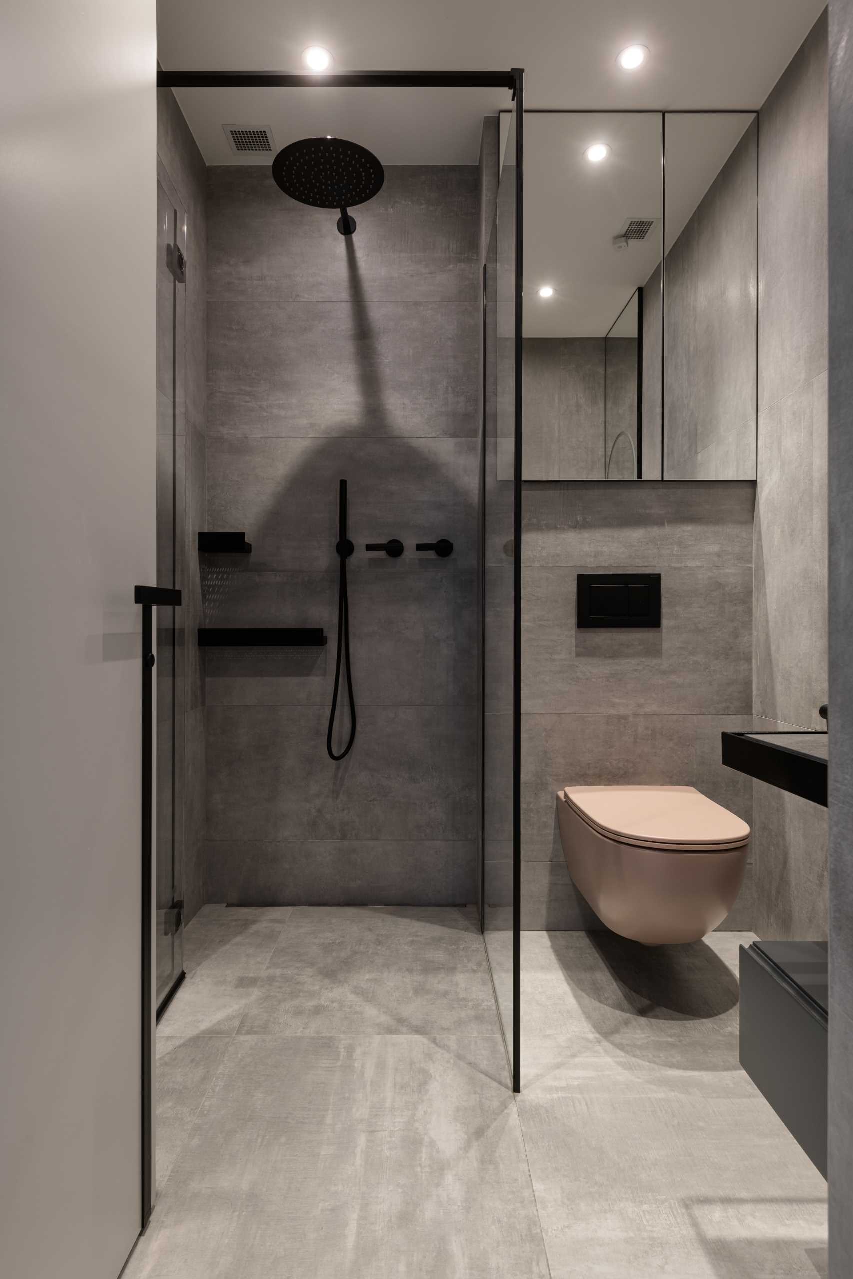 A modern bathroom with black accents.