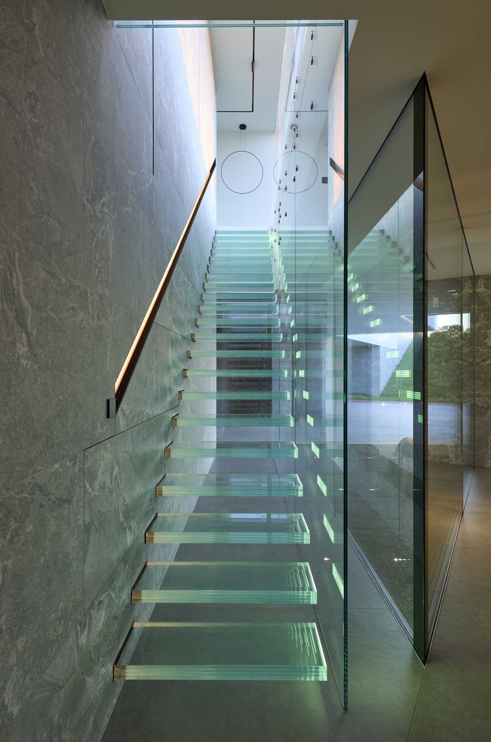 An eye-catching staircase made from glass.