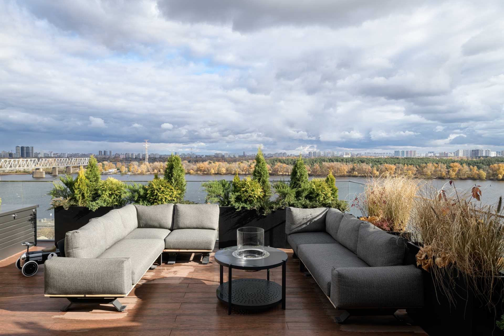 A rooftop terrace with lounge seating.