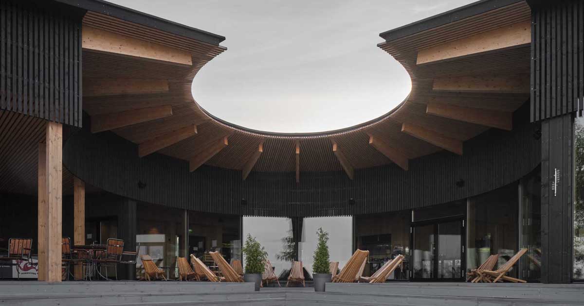 Natural And Blackened Wood Create A Contrasting Design For This Restaurant And Sauna