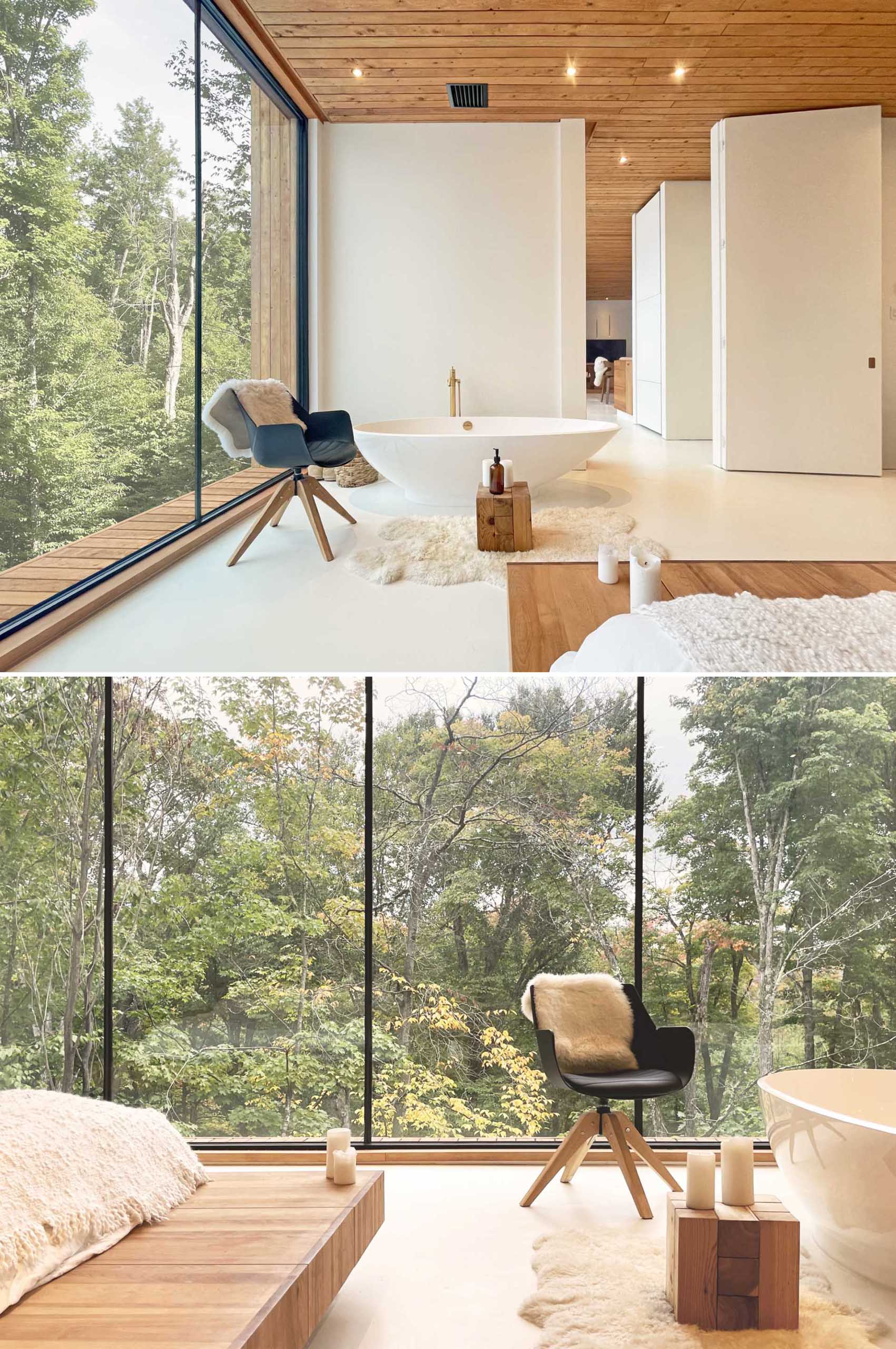 A modern bedroom with floor-to-ceiling windows and a freestanding bathtub.