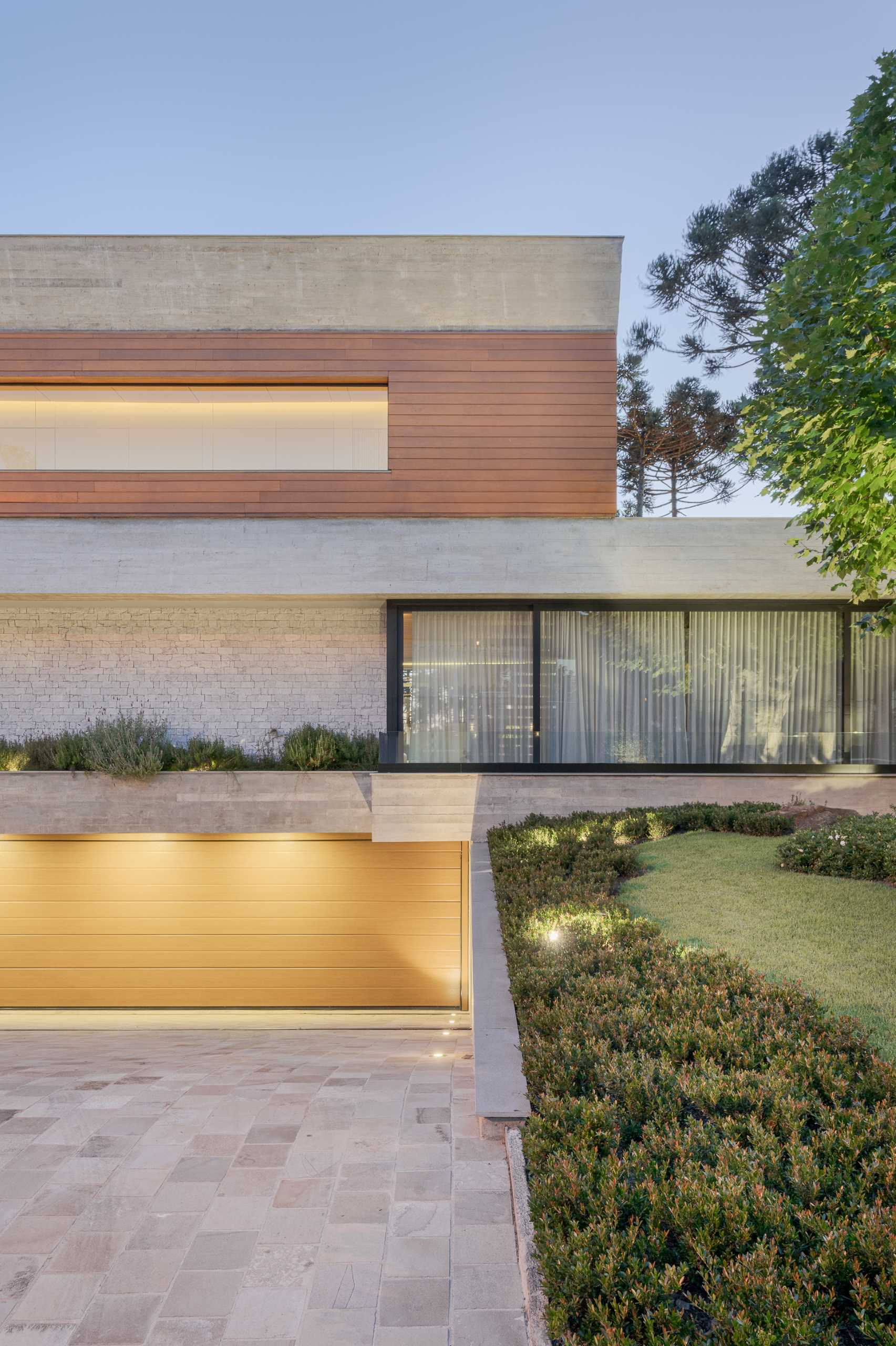 A modern house with a sunken garage.