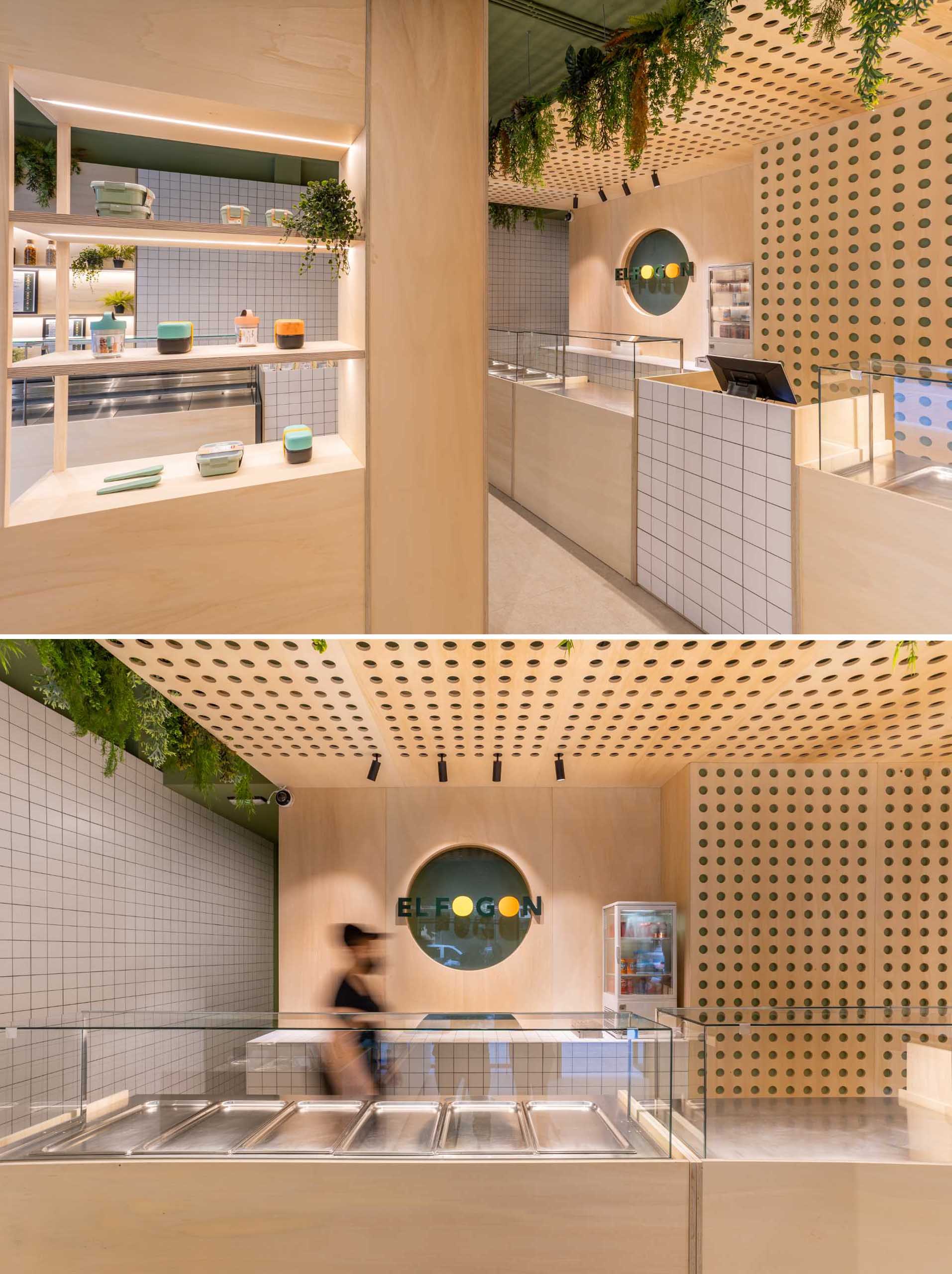 This food service area includes minimalist glass cases, allowing the food to be showcased.