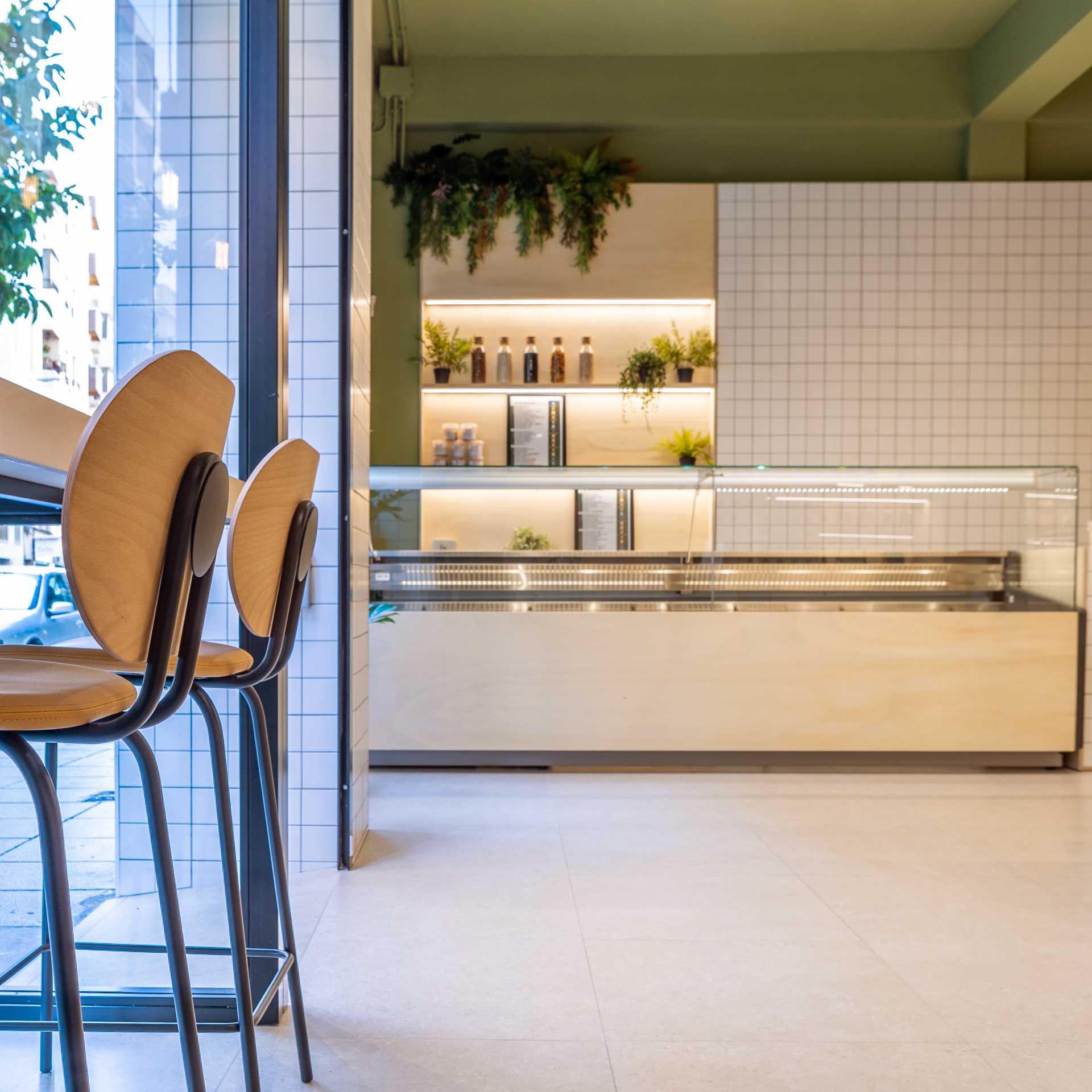 Seats and counters by the window allow patrons watch the street view while eating.