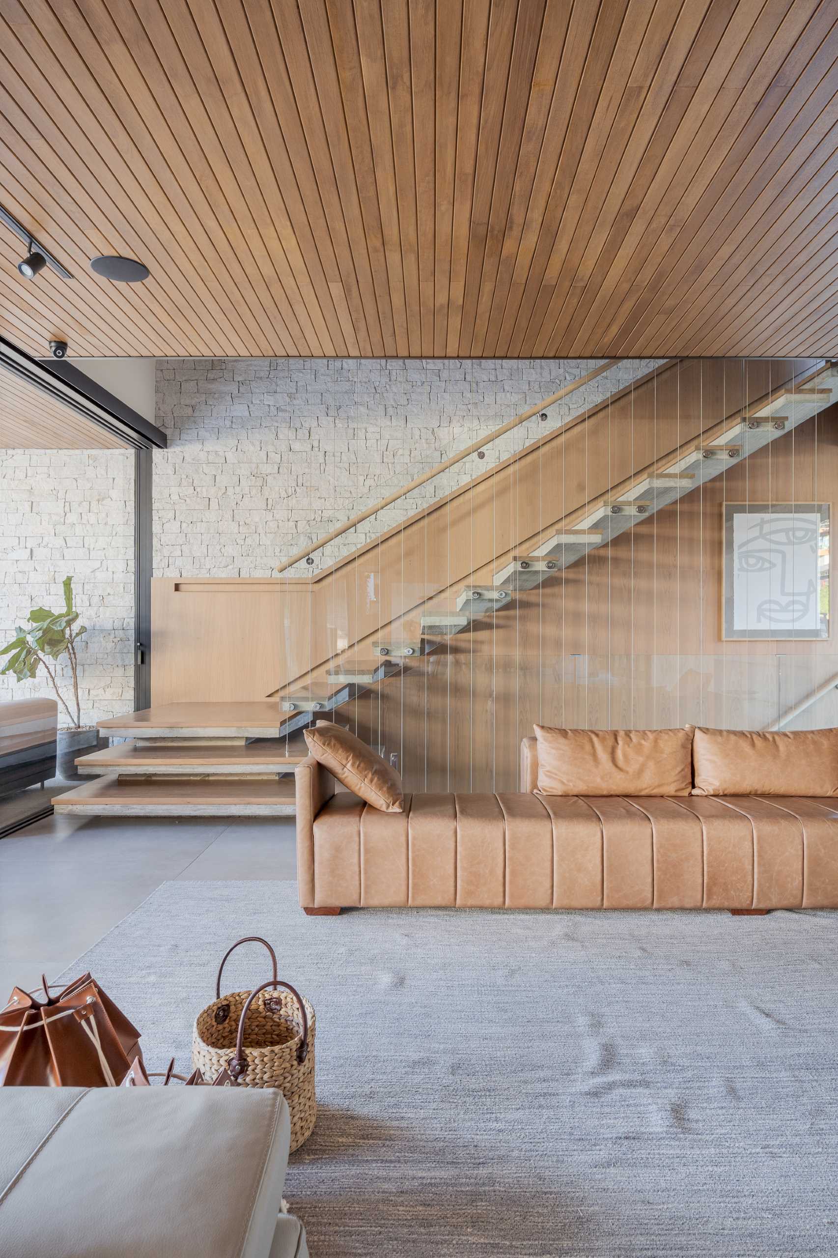 Modern wood and concrete stairs with hidden lighting.